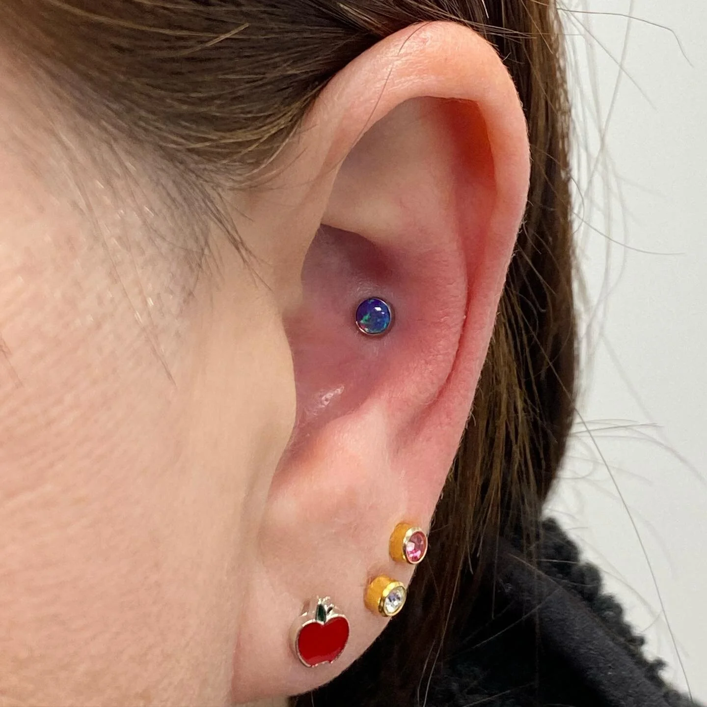 Fresh conch piercing with a purple Opal from @anatometalinc 🔮
&bull;
&bull;
#freebirdtattoo #ellesmereport #cheshire #chester #wirral #liverpool #vegantattoostudio #veganpiercer #conch #conchpiercing #anatometal #anatometaluk #ukpiercer