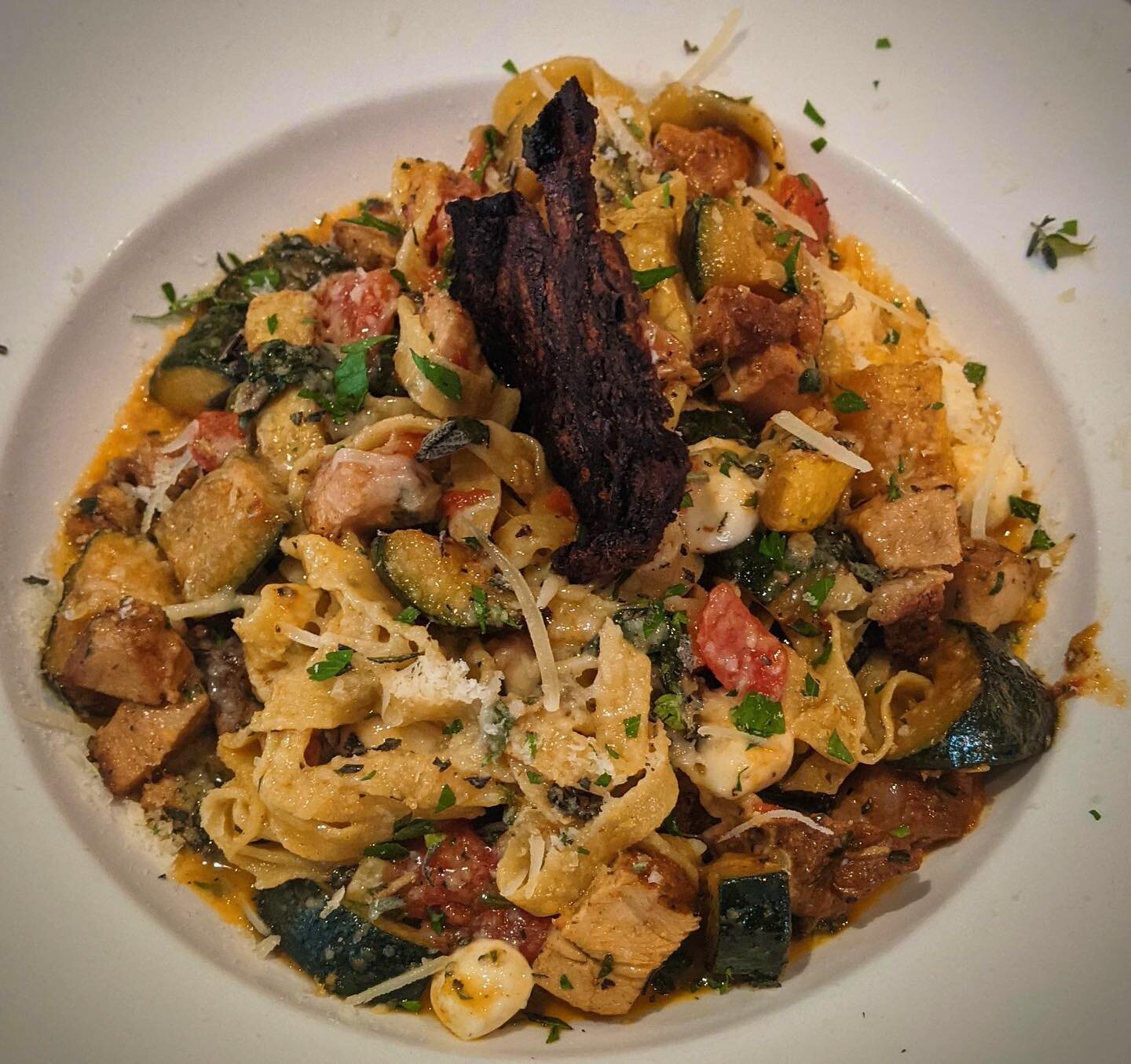 Smoked chicken pasta with house-made fettuccini, zucchini, summer squash, smoked tomato, spinach, and fresh mozzarella pearls!  Come in and give it a try, it&rsquo;s delicious!! Open 5-9pm tonight 😃
