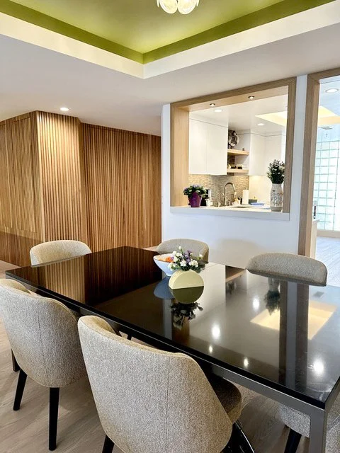 Organic modern and Japandi breakfast nook with wood paneling and built-in shelving by Gin Treadwell Interiors in Santa Clarita.