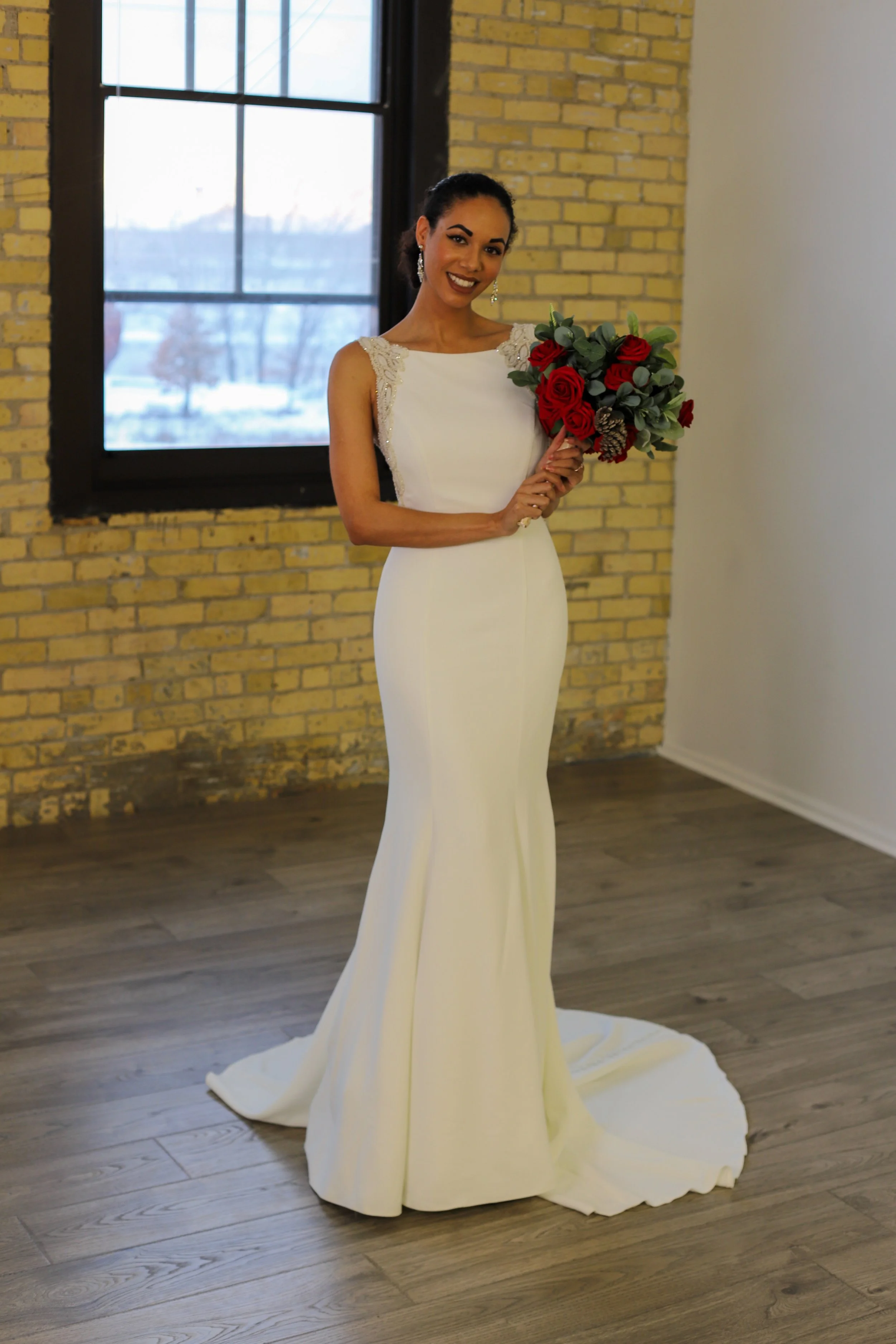 Justin Alexander Bruna
Beaded Crepe Fit and Flare Gown with Sabrina Neckline
Size 12 $1427