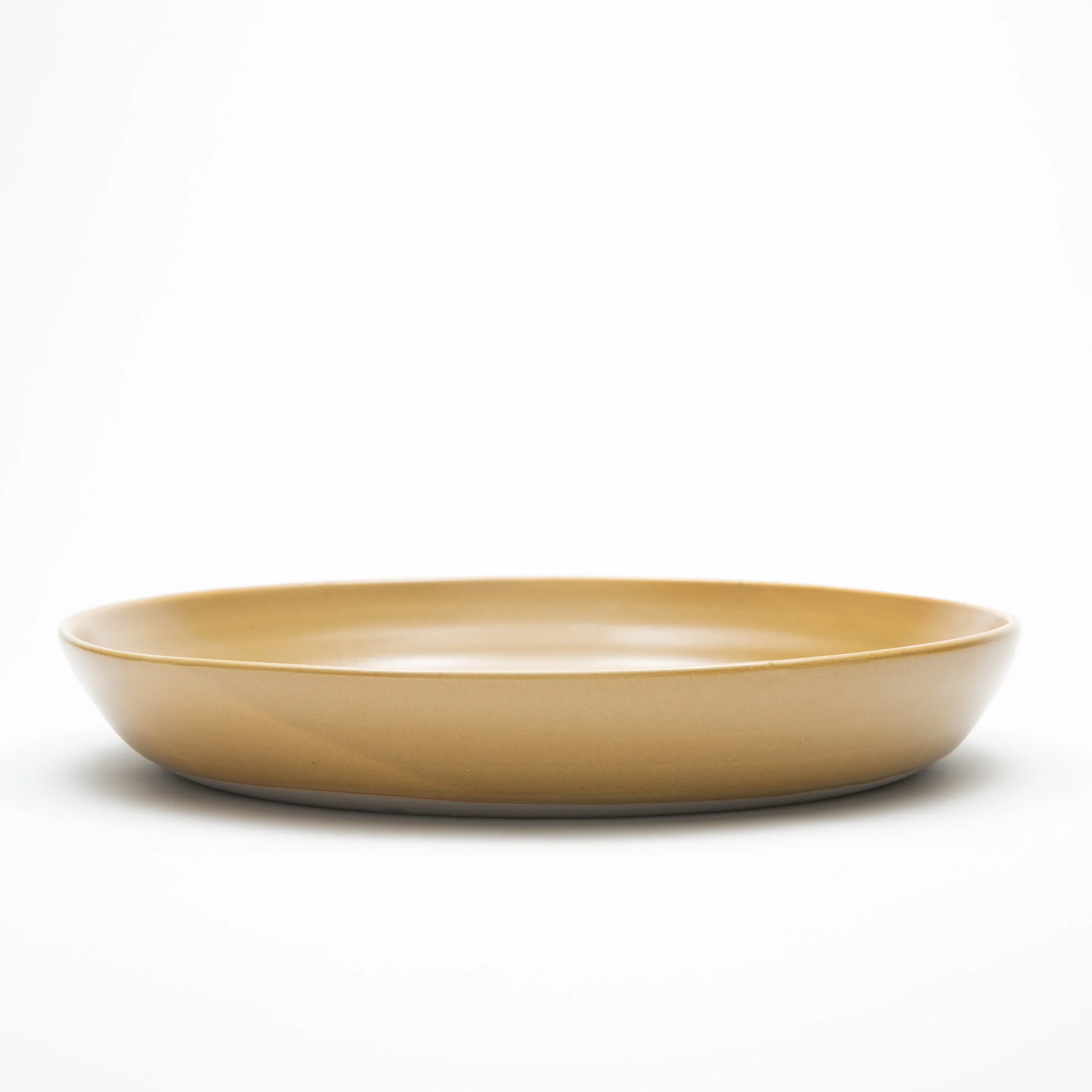 Lg round plate mustard.jpg