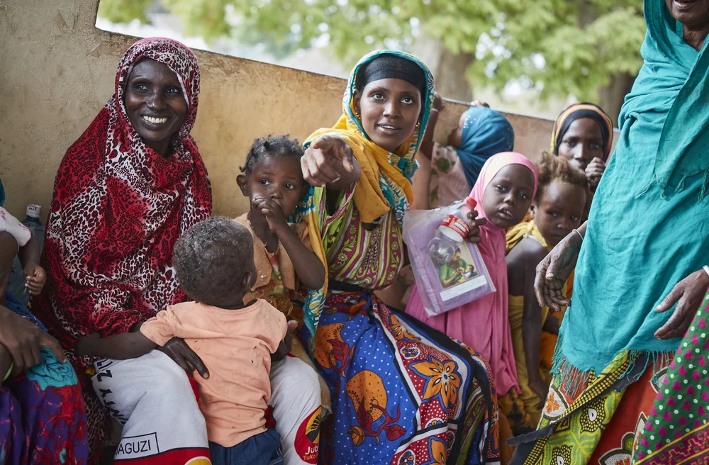 Women waiting at a Safari Doctors mobile clinic