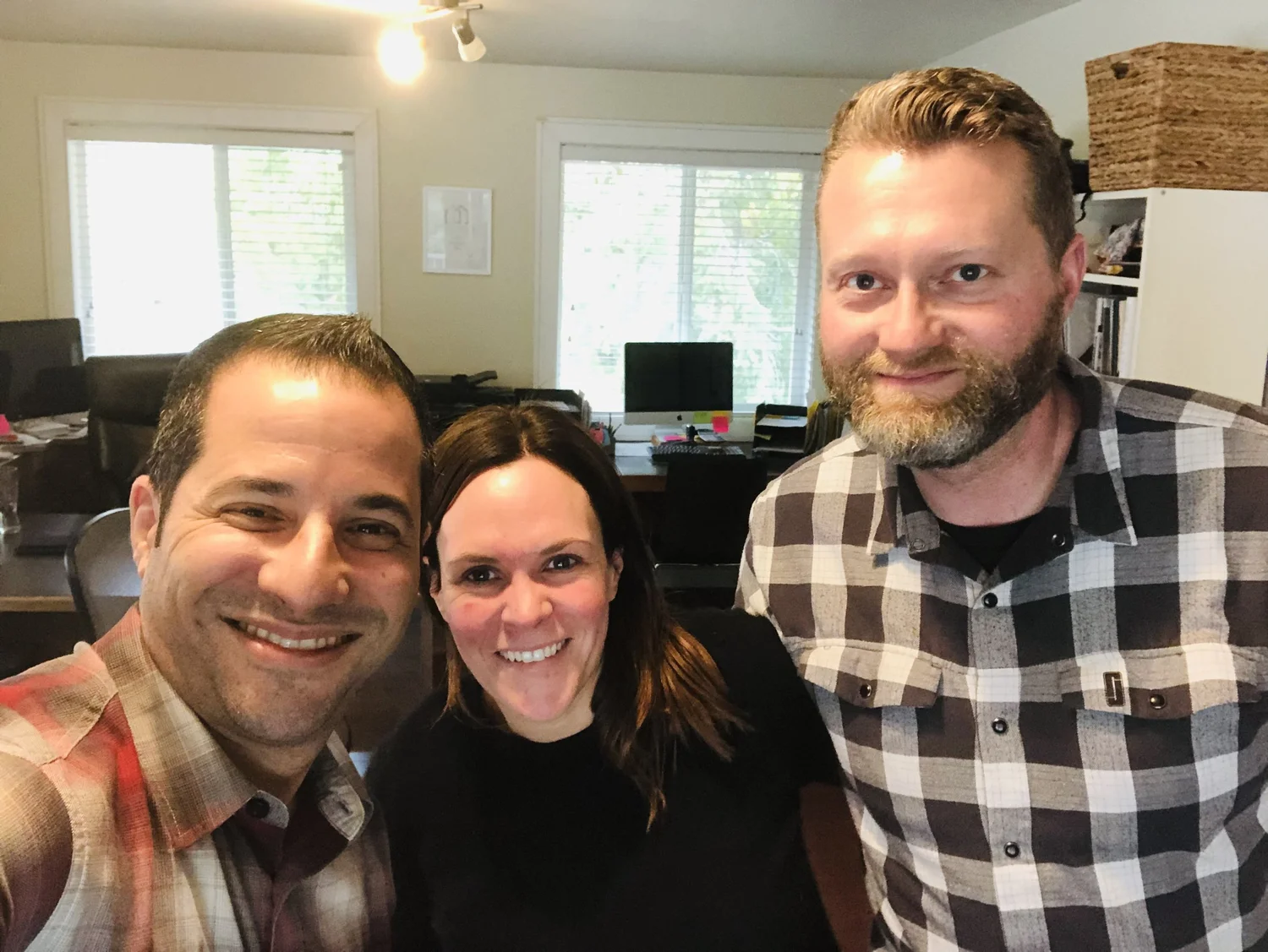 Jesse and Amanda Stevens of Jesse J Contracting, a Kelowna BC renovation and custom home builder and Bryan Kaplan coaching client