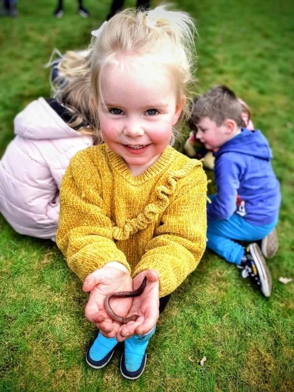 Castlehill Woods 2022 Girl with Worm2 small.jpg