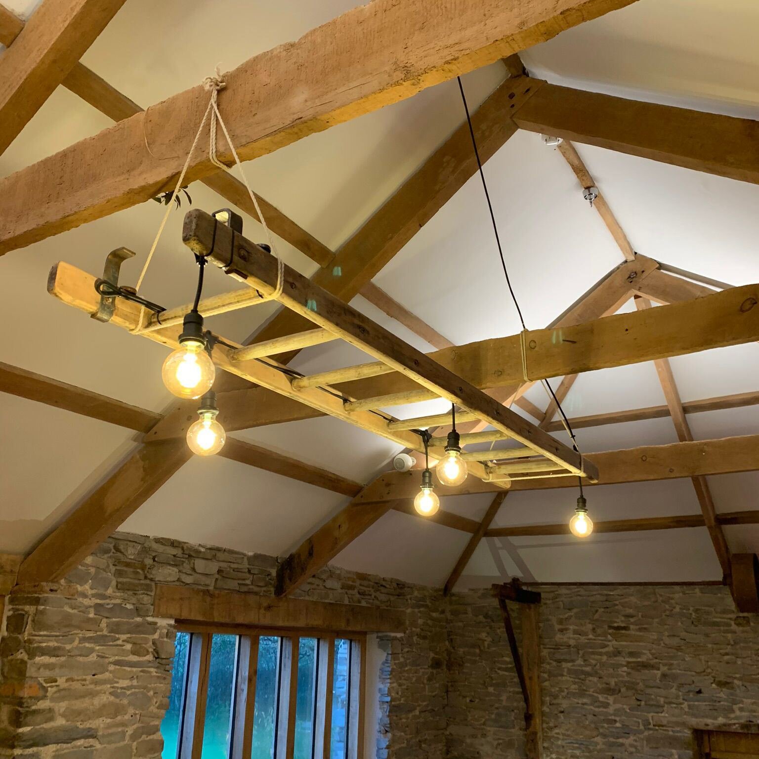 Alex and Cassie at @light_up_weddings  create these pretty, rustic lighting installations for weddings and events. They look perfect in our Barton Reception Barn, as we think you&rsquo;ll agree!