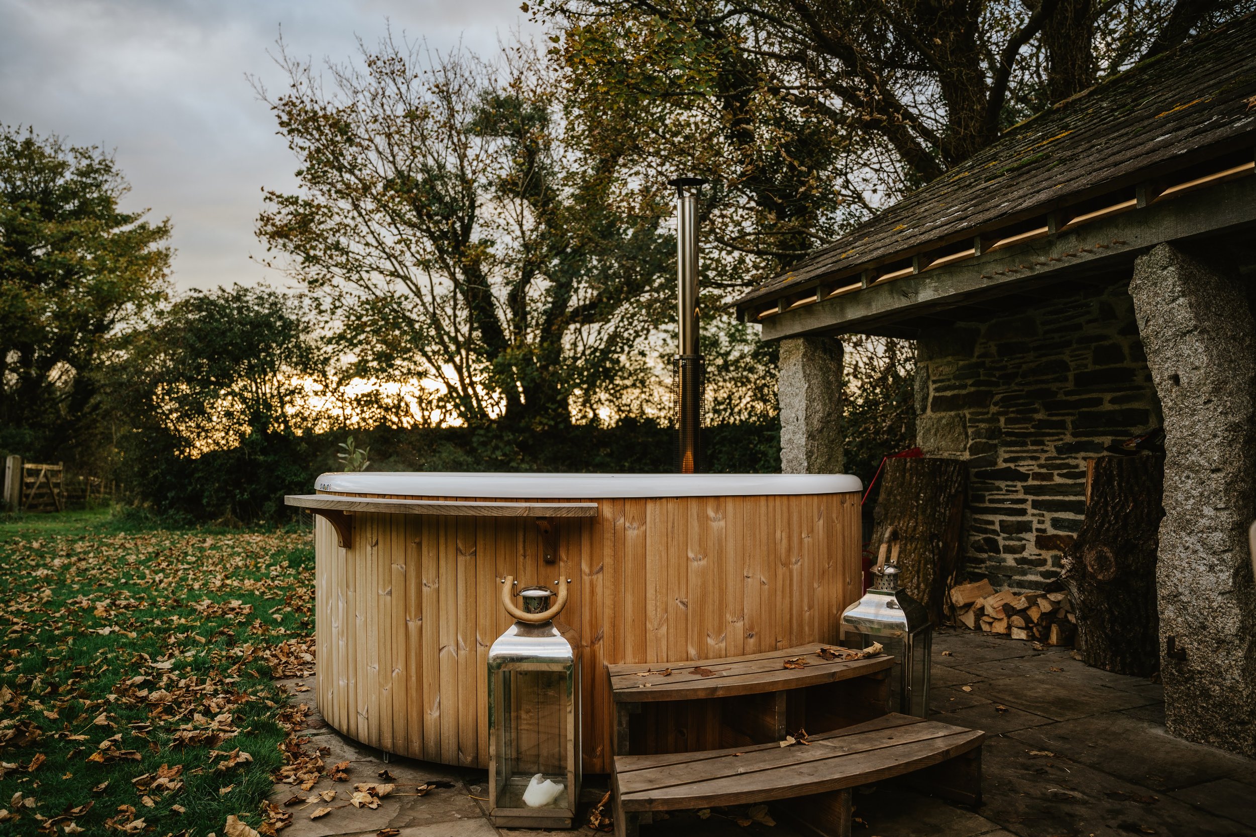 Hot tub in the grounds of the Barton at the Boconnion wedding venue, Bodmin, Cornwall