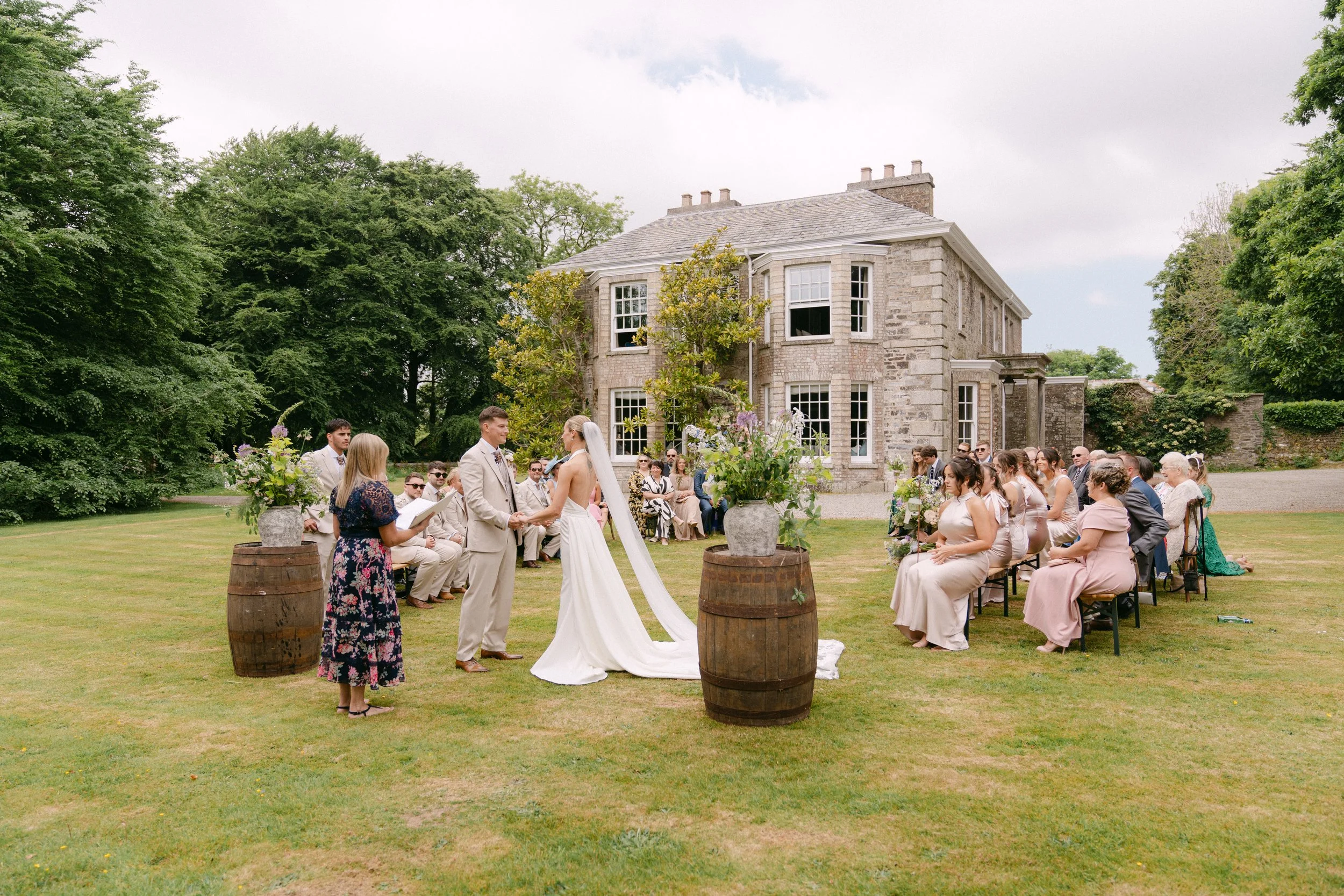 Outdoor wedding ceremony in front of the Manor House at Boconnion, Bodmin, Cornwall