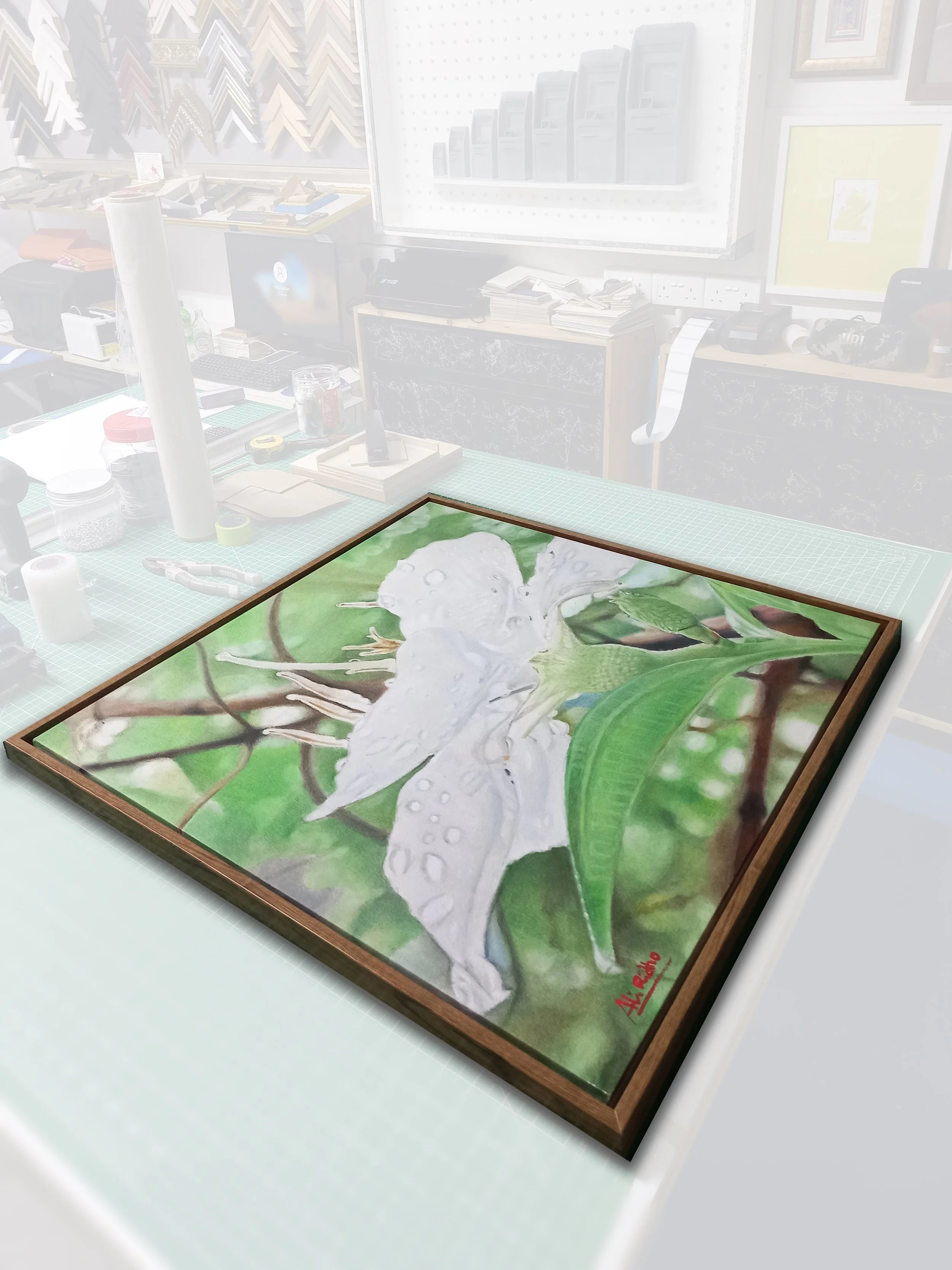 A framed painting of a white owl perched on a tree branch with green leaves, signed by the artist 'H. Reine' in red at the bottom right corner.