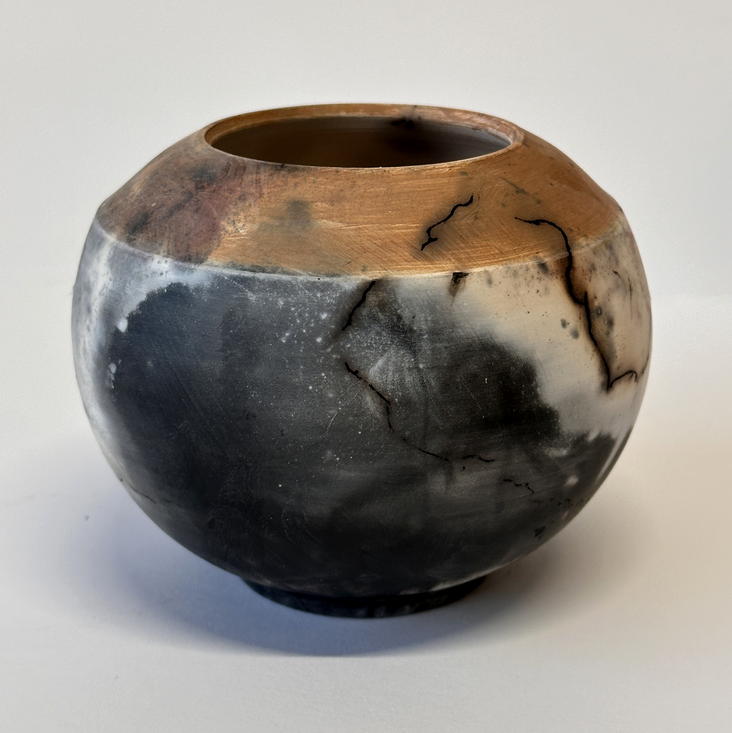 Demetria Chappo Smoke Fired Heat Lightening Orange Rim V2.png