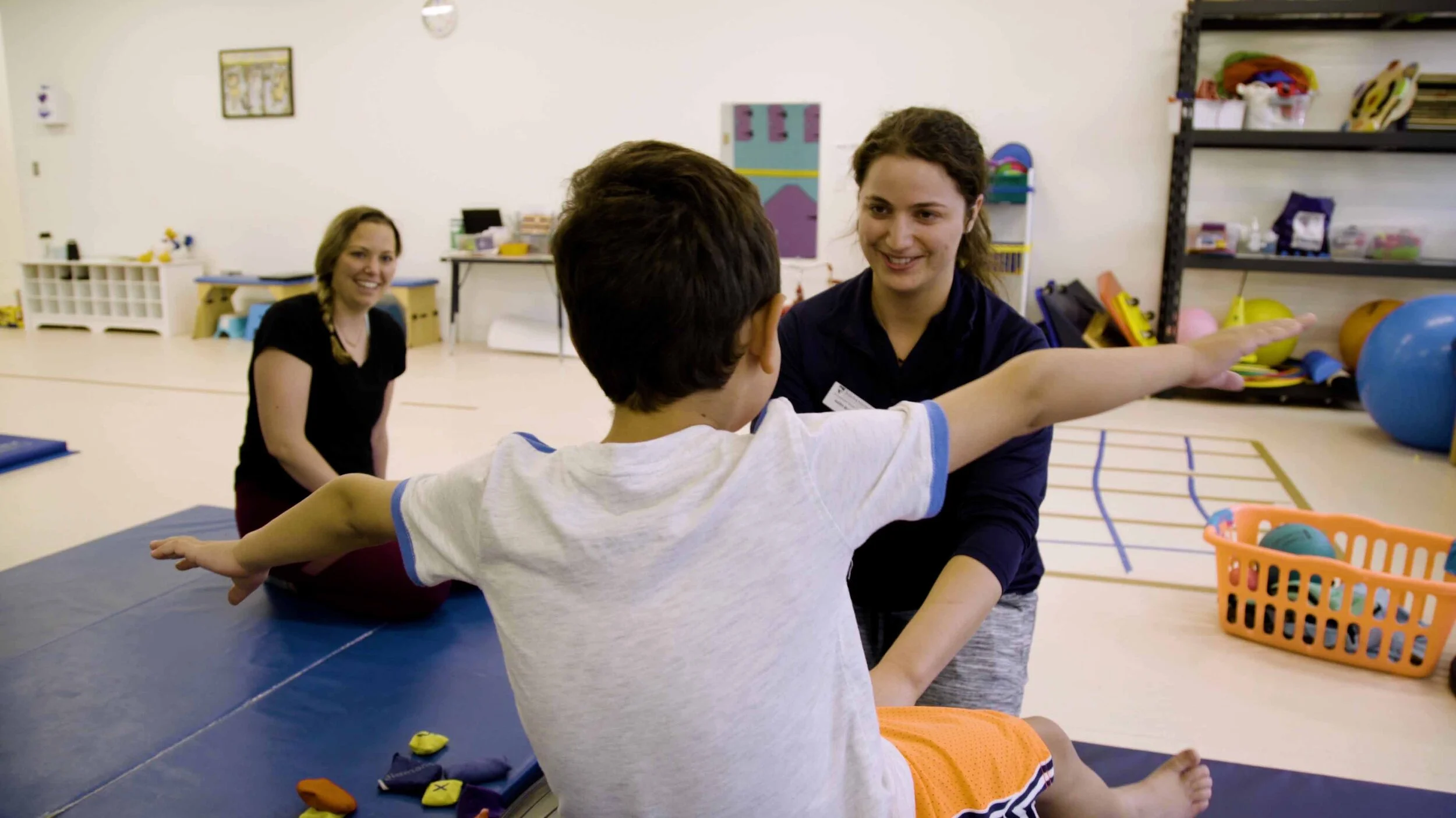 OT_PT Child balancing on ball 3.jpg