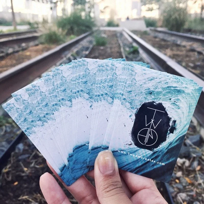 Two AM Stickers and Logo
