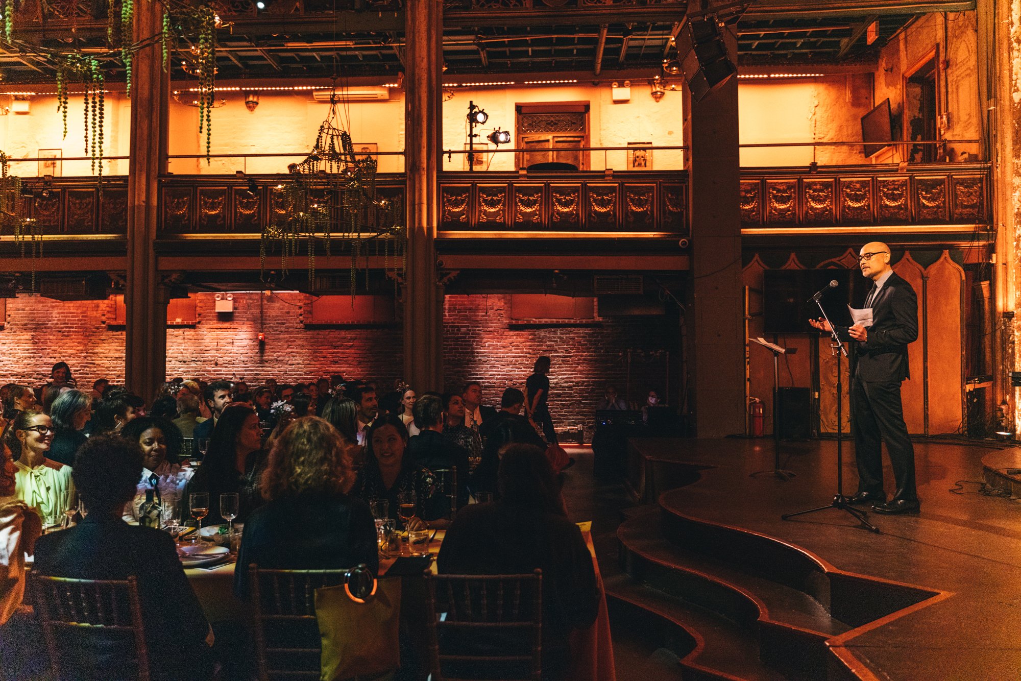 Marc Tsurumaki welcomes guests to the 40th Anniversary Benefit