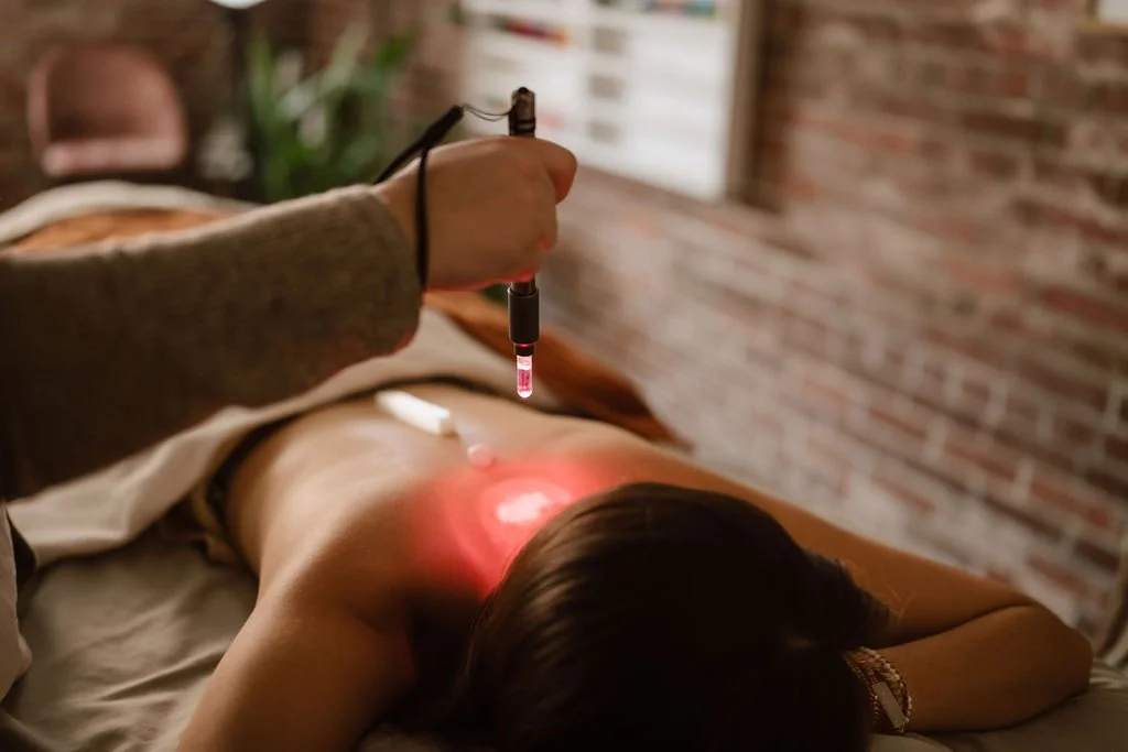 Color light therapy on a person's back