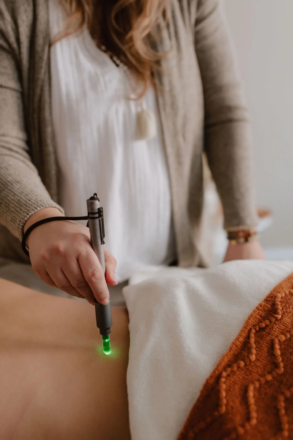 Person relaxing during color light therapy