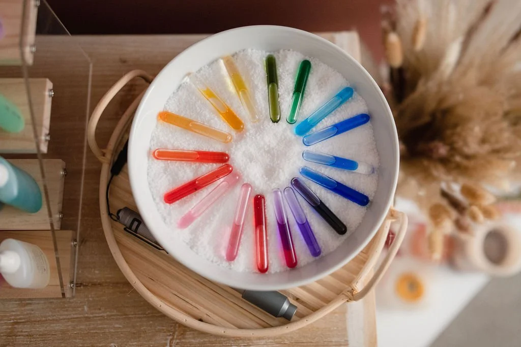 Colored vials arranged in a circle