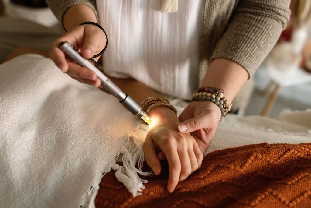 Hands being held with light