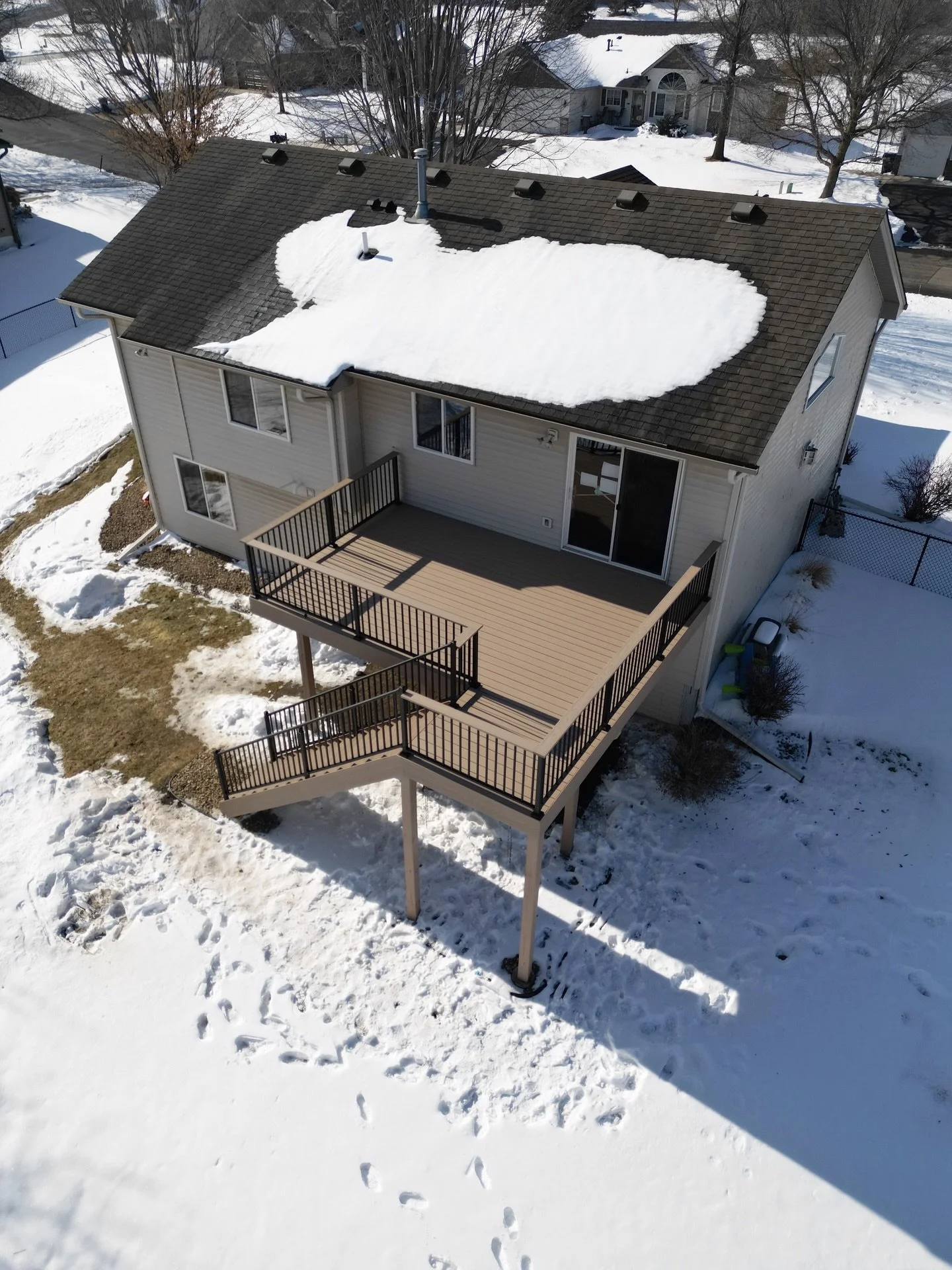 Built this one through the seasons 🌦️❄️➡️☀️
We kicked this project off in Spring weather, powered through a surprise snowstorm, and finished just in time to enjoy it the way it was meant to be&mdash;under the sun.

Featuring Brownstone @timbertech P