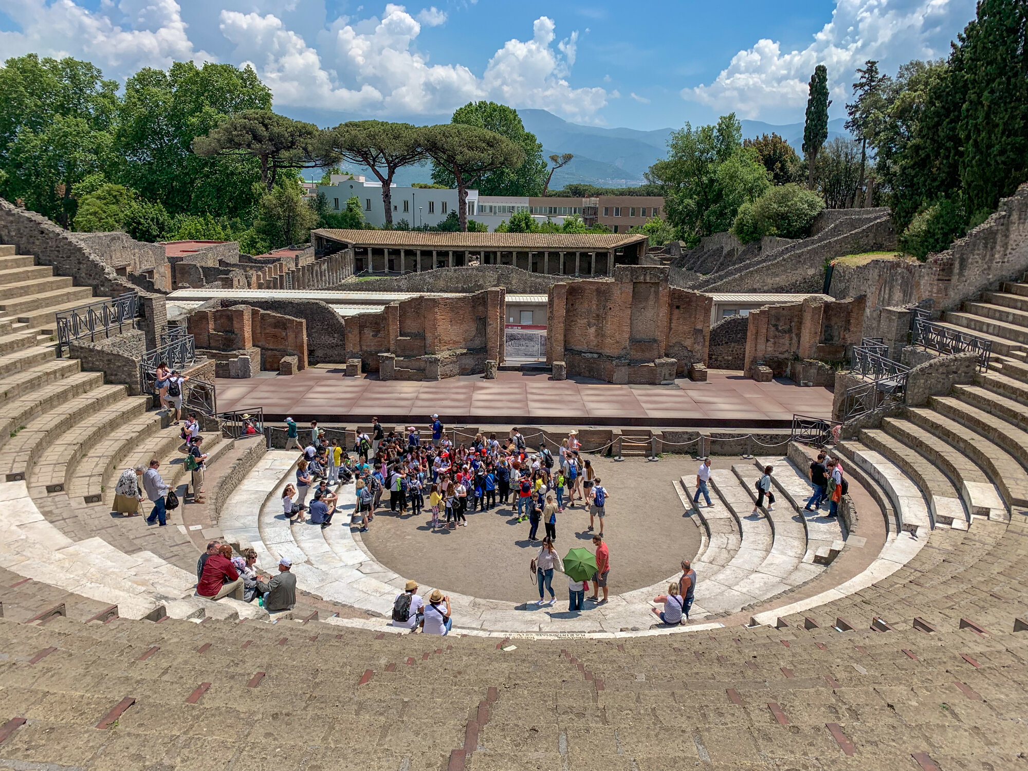 Ancient stone amphitheater at the archaeological site of Pompeii, Italy.