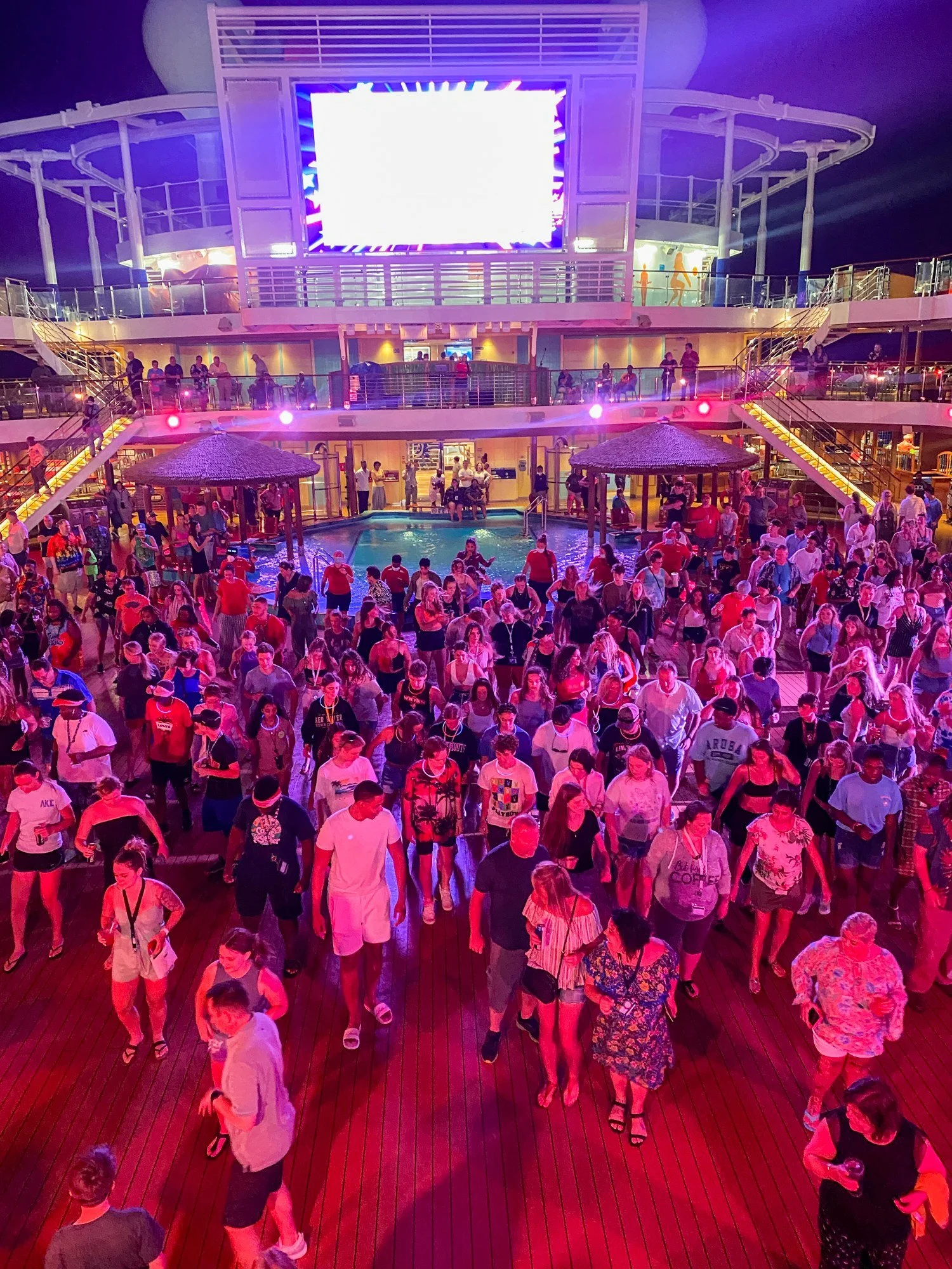 Crowd attending an evening event in the Carnival Horizon atrium