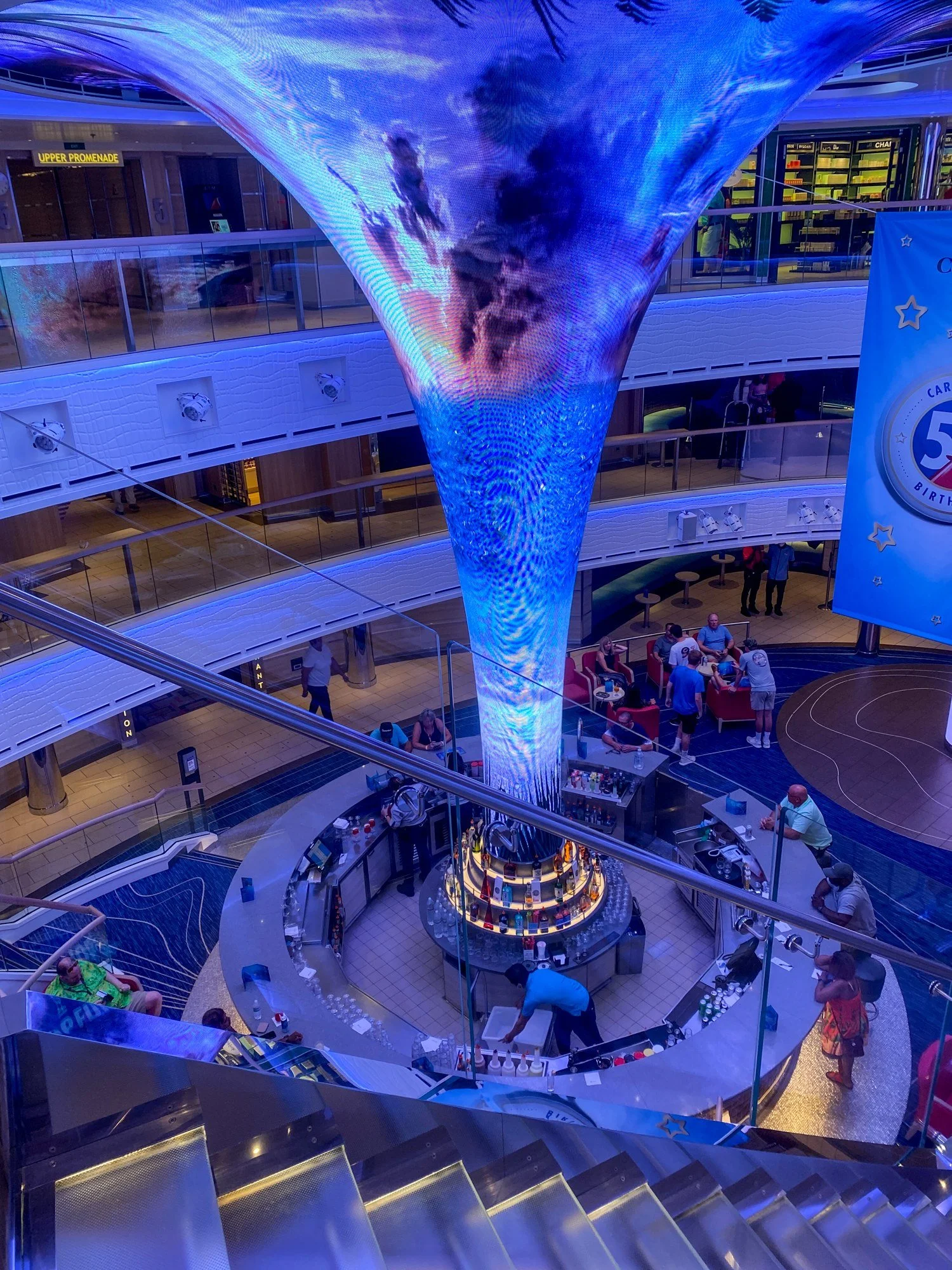 Illuminated tornado sculpture inside the Carnival Horizon atrium
