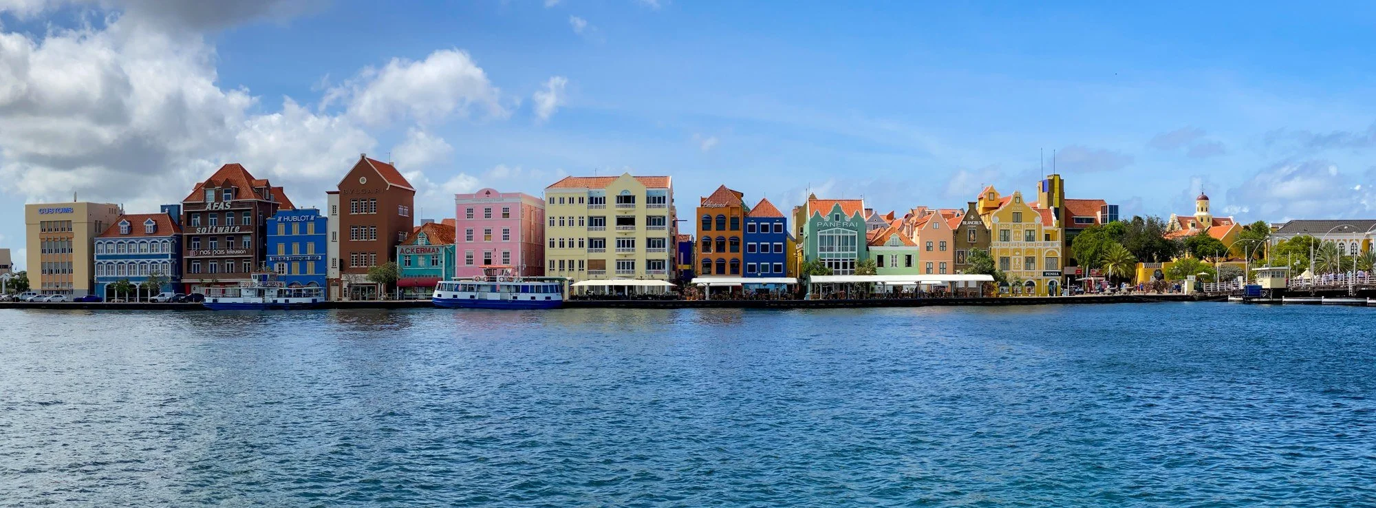 Colorful Handelskade waterfront across the harbor in Willemstad, Curaçao