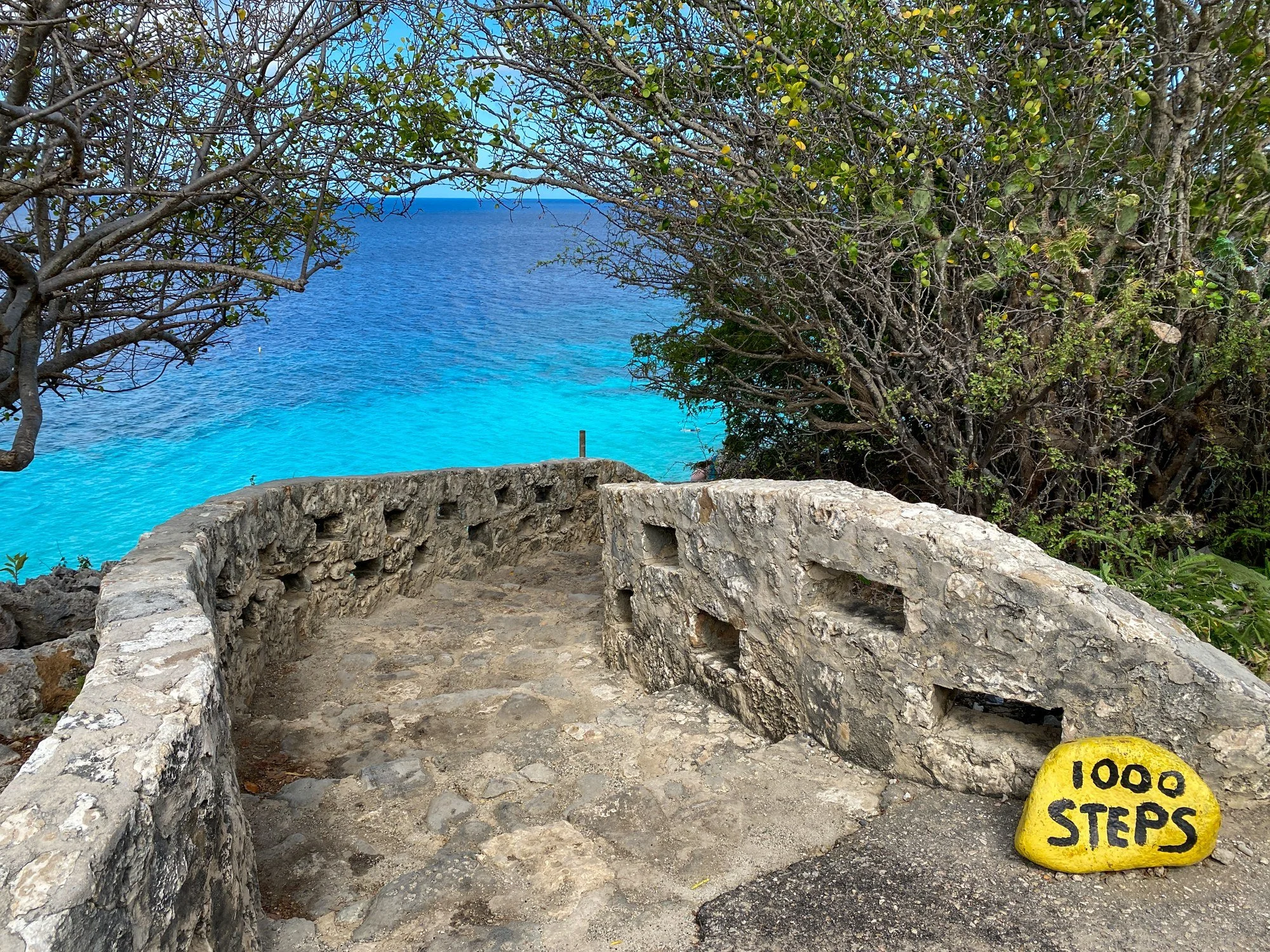 Stone staircase and sign at 1,000 Steps in Bonaire