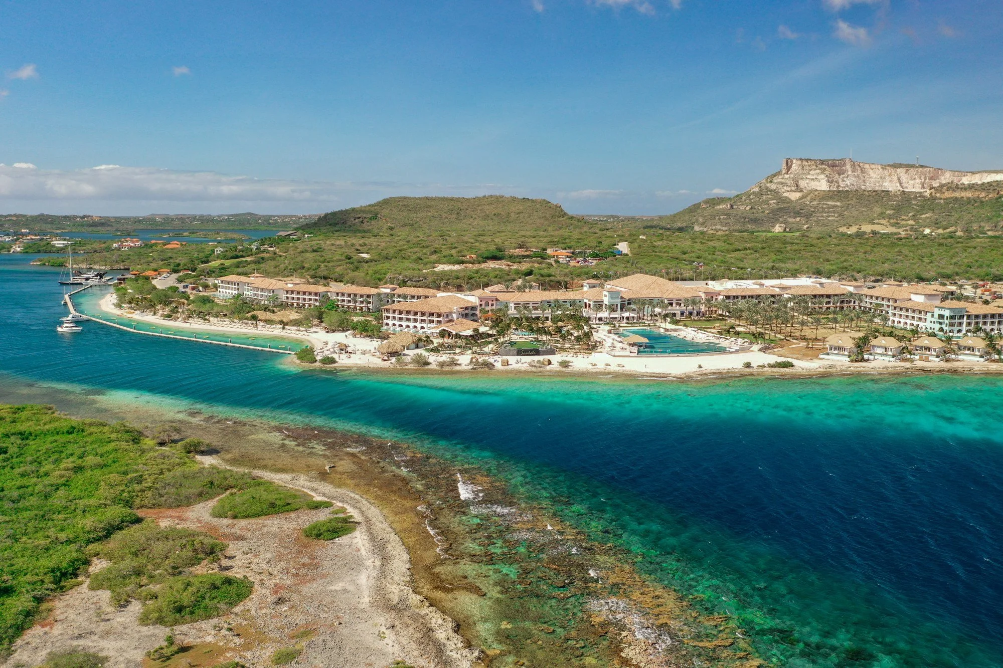 Aerial view of Spanish Water and the rugged Curaçao coastline