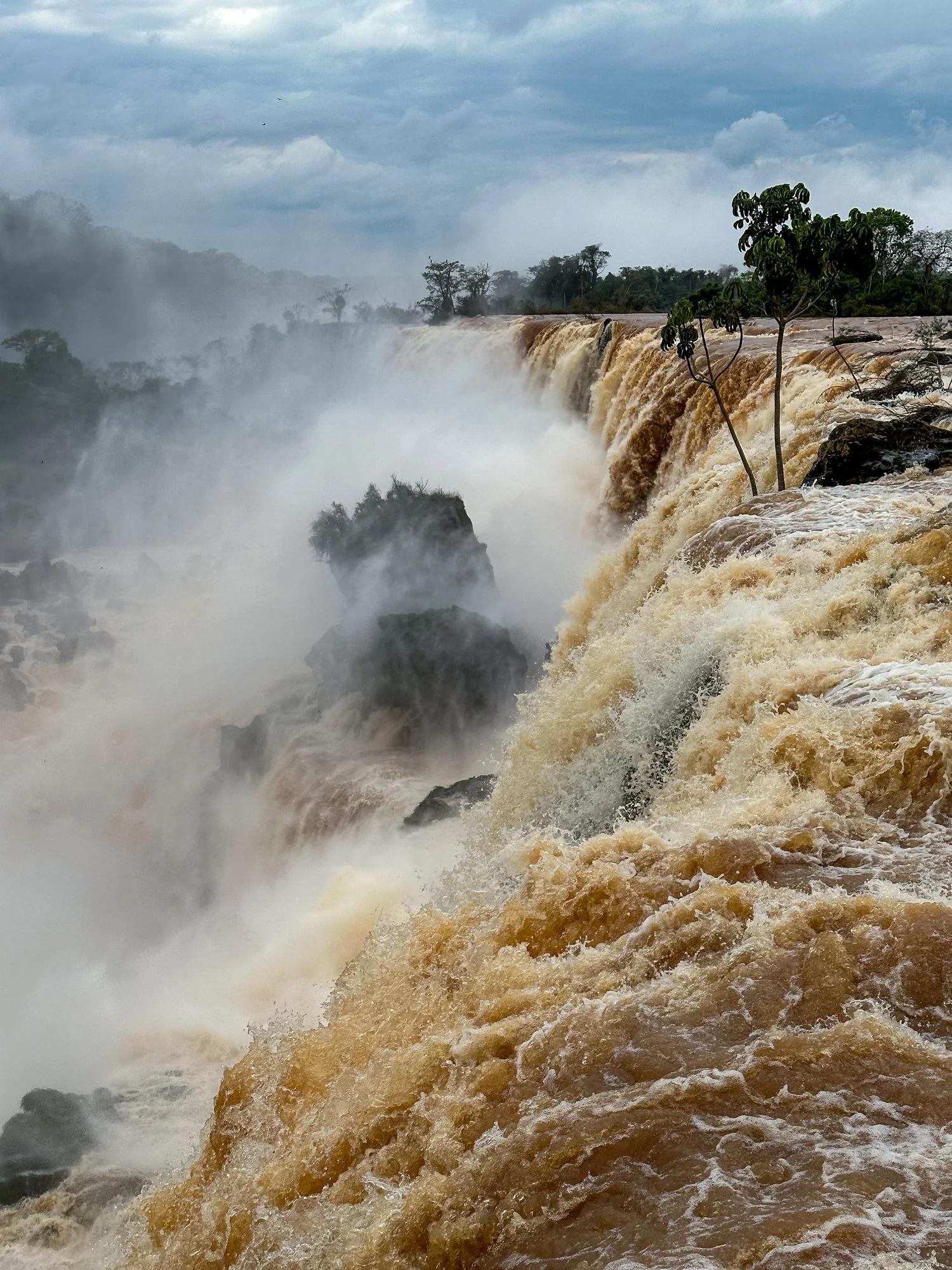 Wide view across Iguazú Falls from the Argentine side
