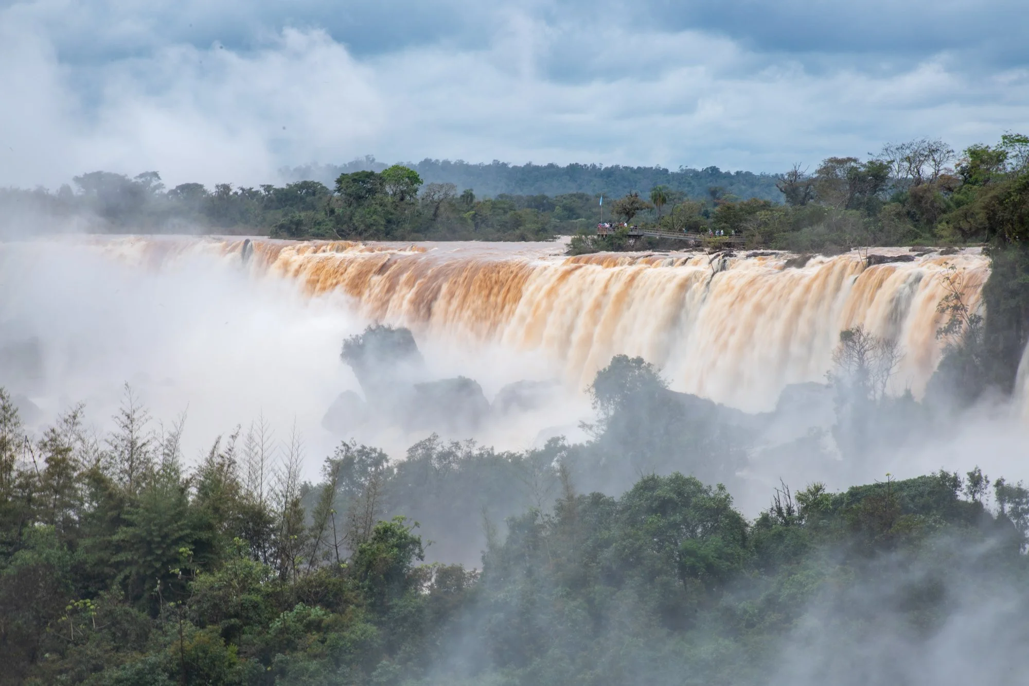 Panoramic view of Iguazú Falls and mist in Argentina