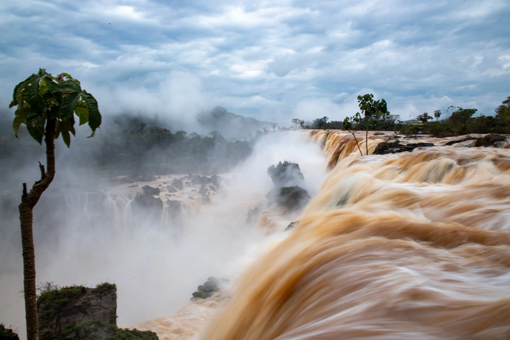 Rushing water at the edge of Iguazú Falls in Argentina