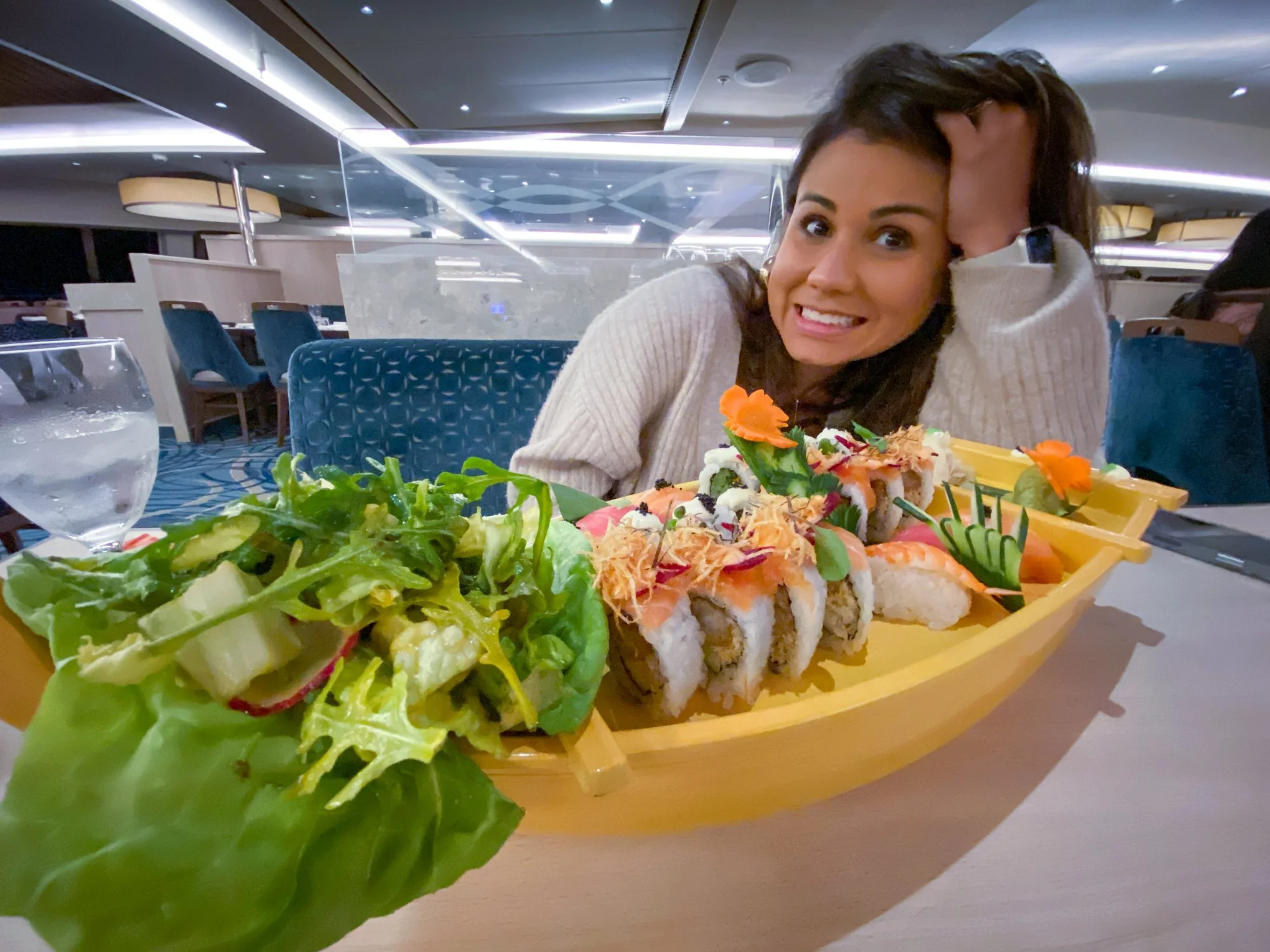 Amanda enjoying sushi for dinner aboard Carnival Radiance