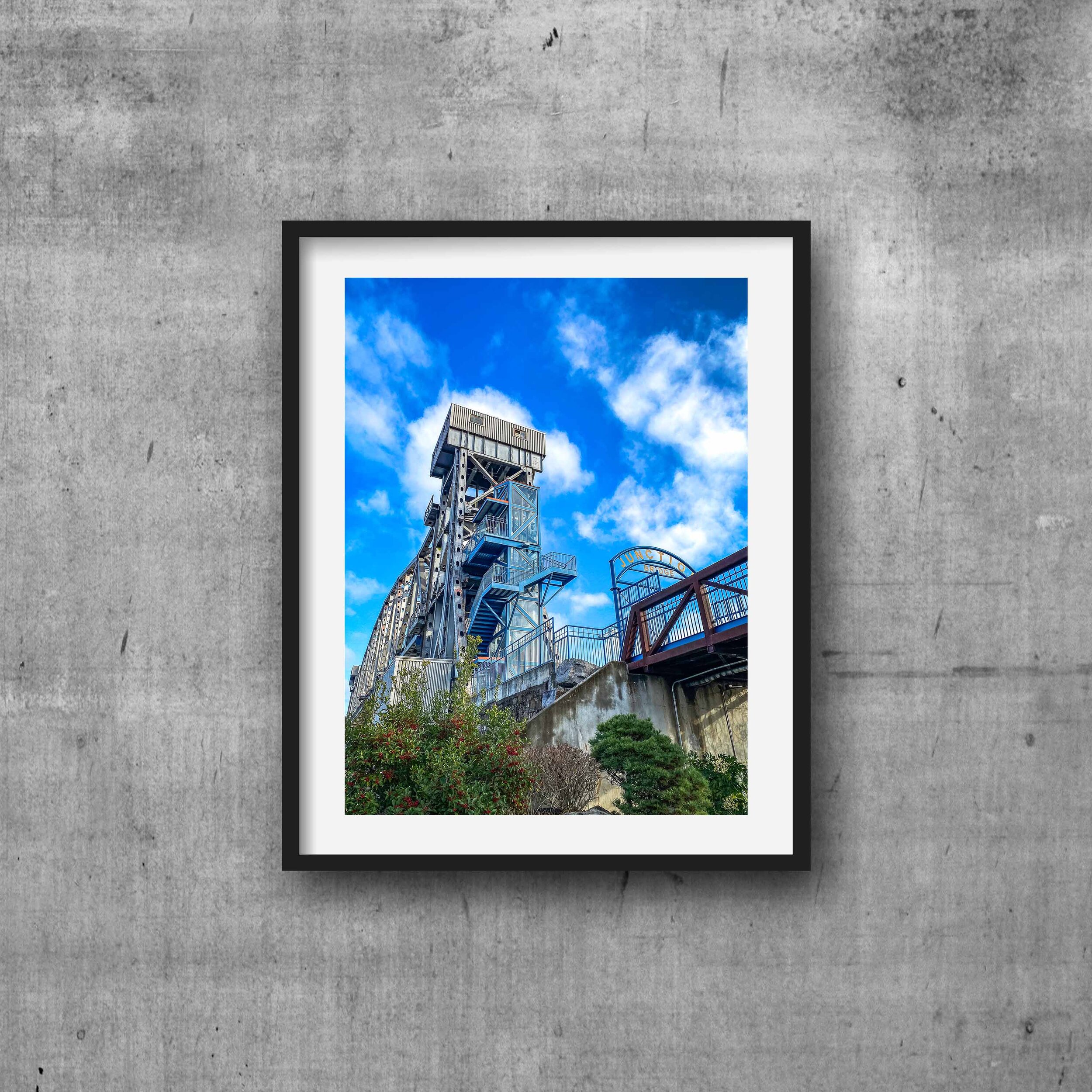 Junction Bridge Black Frame Concrete Mockup.jpg