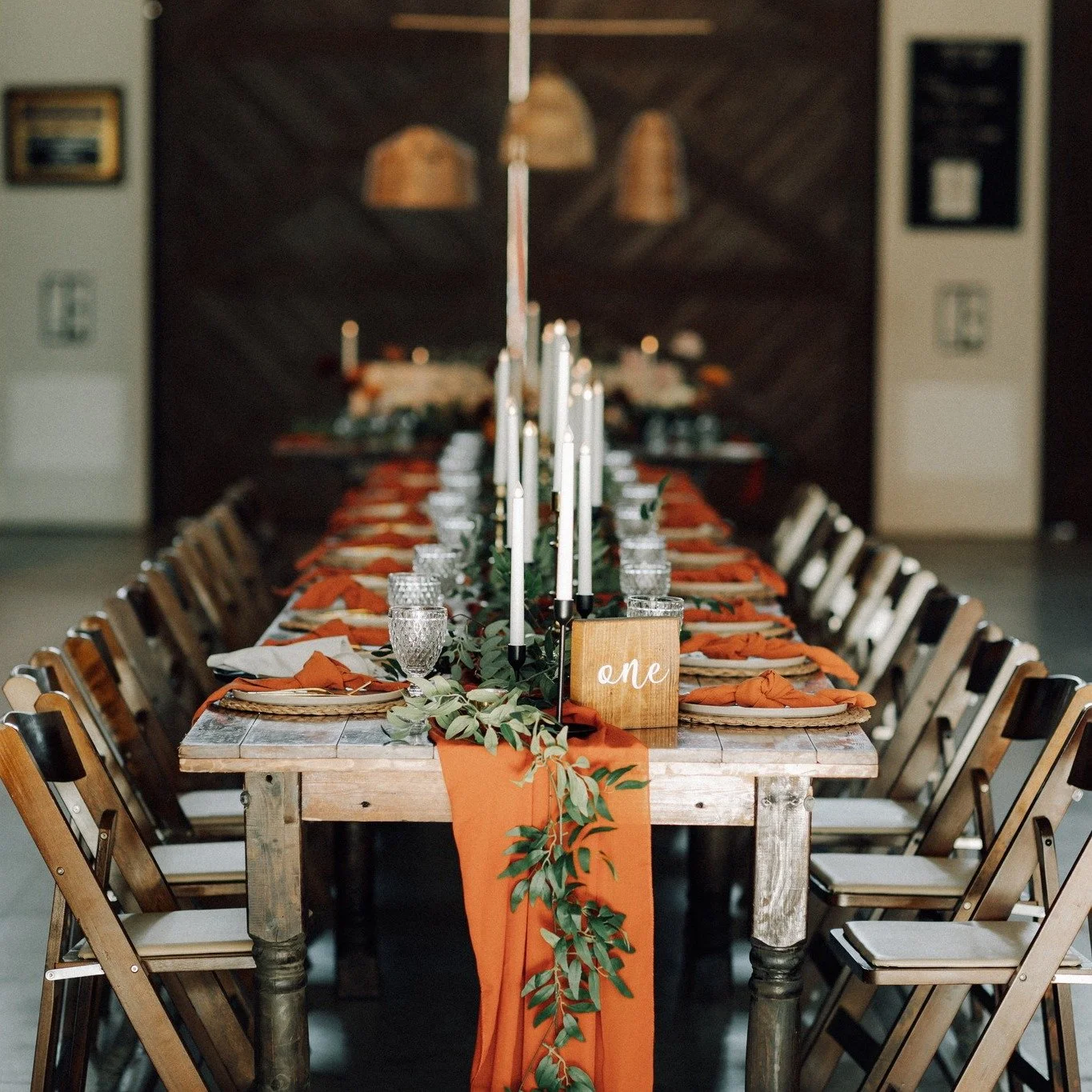 The perfect backdrop for good food and great company. 🥂 Provide your guests with an elevated dining experience with Blacksheep.

Items featured in photo: Harvest table, fruitwood chair, terracotta chiffon runner, terracotta linen napkin, clear 12oz 
