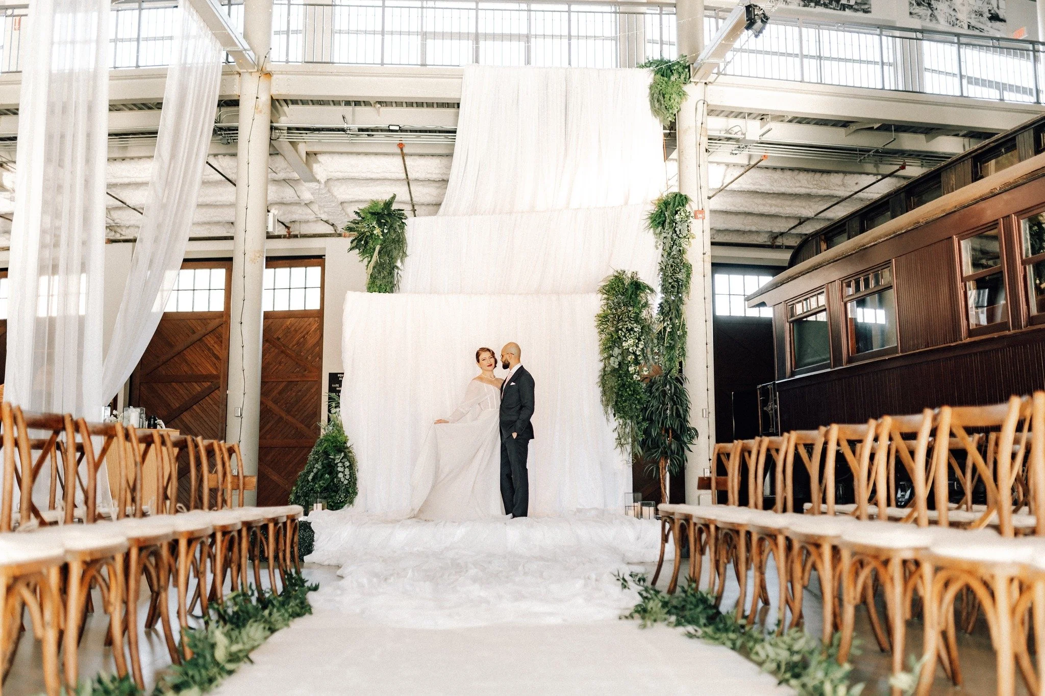 A dream backdrop for your "I do&rsquo;s" ✨ Create a breathtaking ceremony space with Blacksheep&rsquo;s collection of elegant seating and billowing drapes. 🤍

Items featured in photo: Crossback vineyard chair with cushion, white runner car