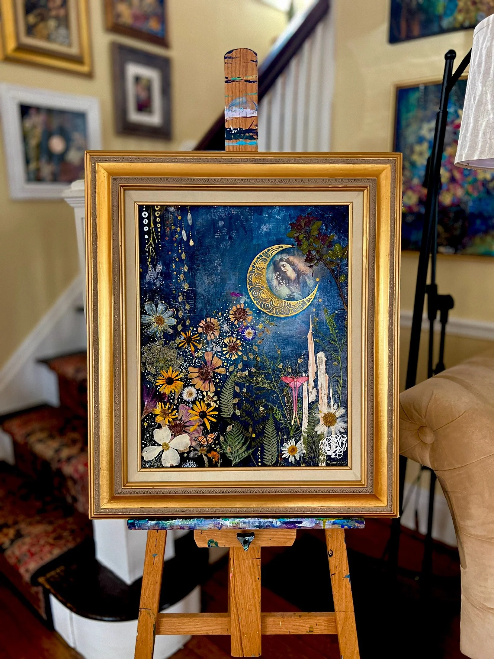 Woman on moon sending beam of flowers into a garden below.