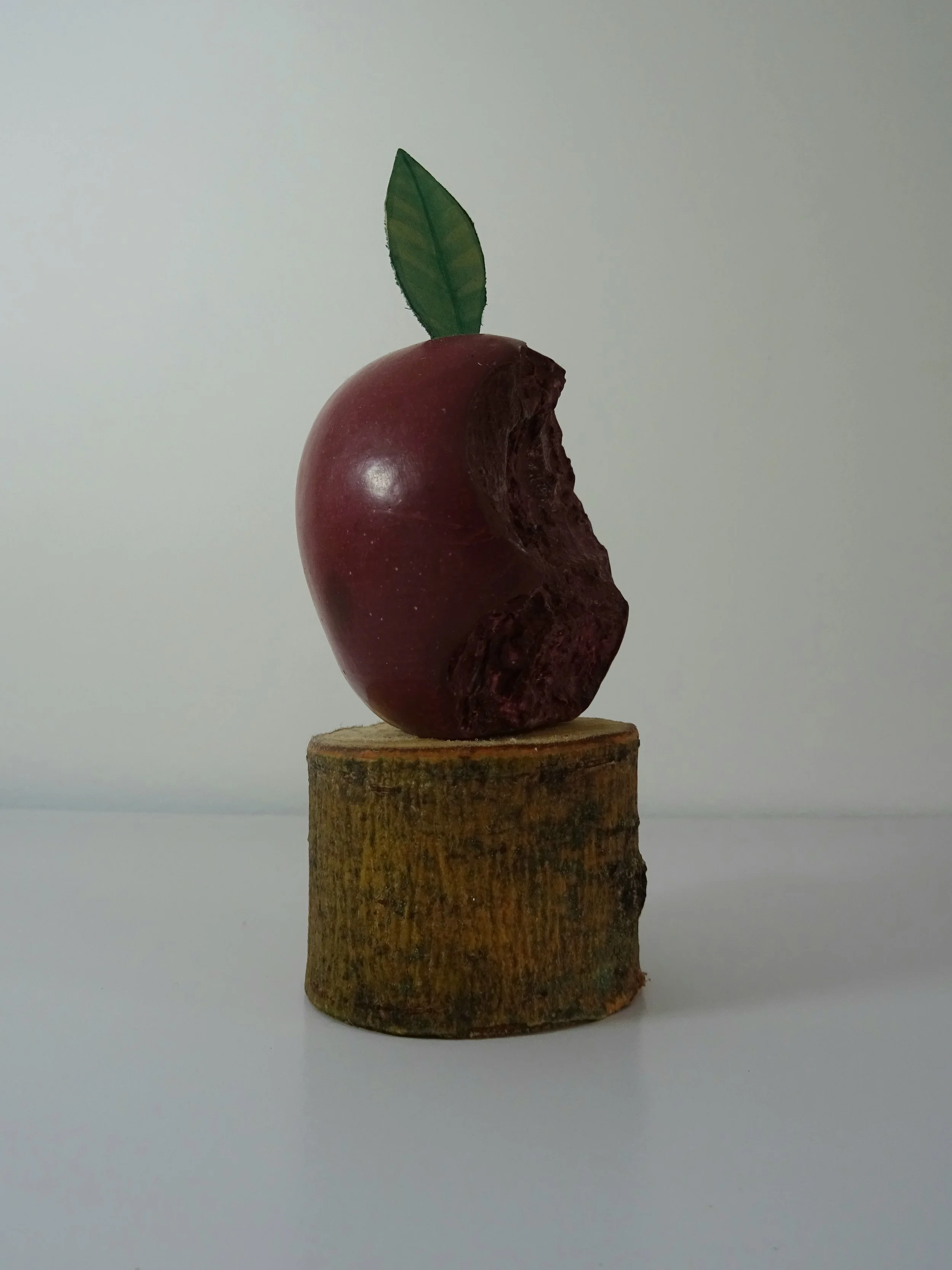 My Dad's Apple, (Eaten) 2026. 

Various apples, various materials: Jesmonite, Resin, Apple Tree, Pigment, Gold leaf, acrylic. 

First 5 single apples (Whole, Bitten or Eaten) available for donation of £100 + 