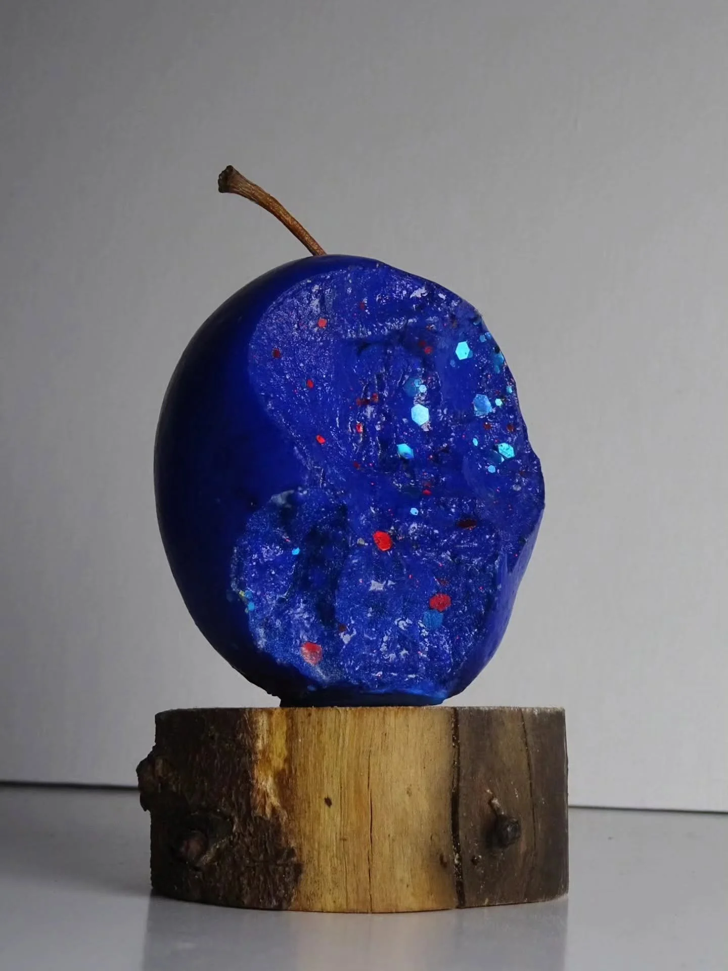 'Blue Ether' (Bitten), Crystacal, Pigment, Varnish, Beeswax, Glitter, Apple Tree & Stem, 2026. (AVAILABLE)