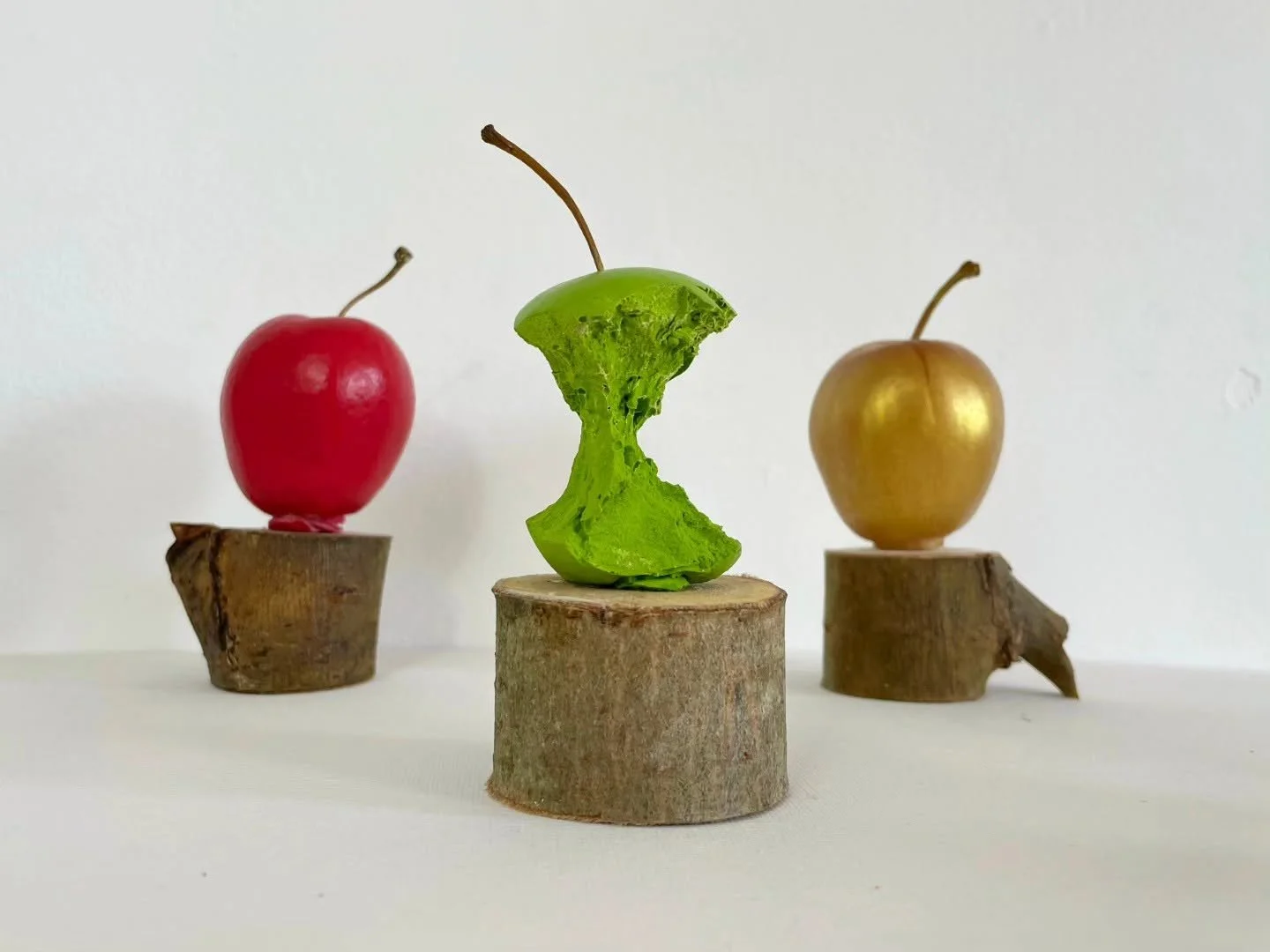 My Dad's Apple, 2026. 
Various materials, Jesmonite, Resin, Apple Tree, Pigment, Gold leaf, acrylic. 
A single apple for Donations of £200 +

10 of 10 available.