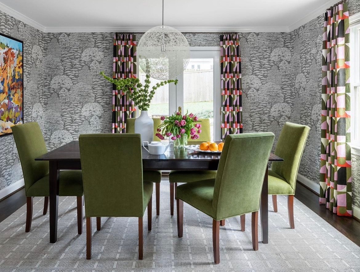 When styling this dining room we knew we needed to incorporate orange as our client loves this color, so much so that we really needed to explain that sometimes you need less of a color to make it really pop out. By incorporating bold drapery and art