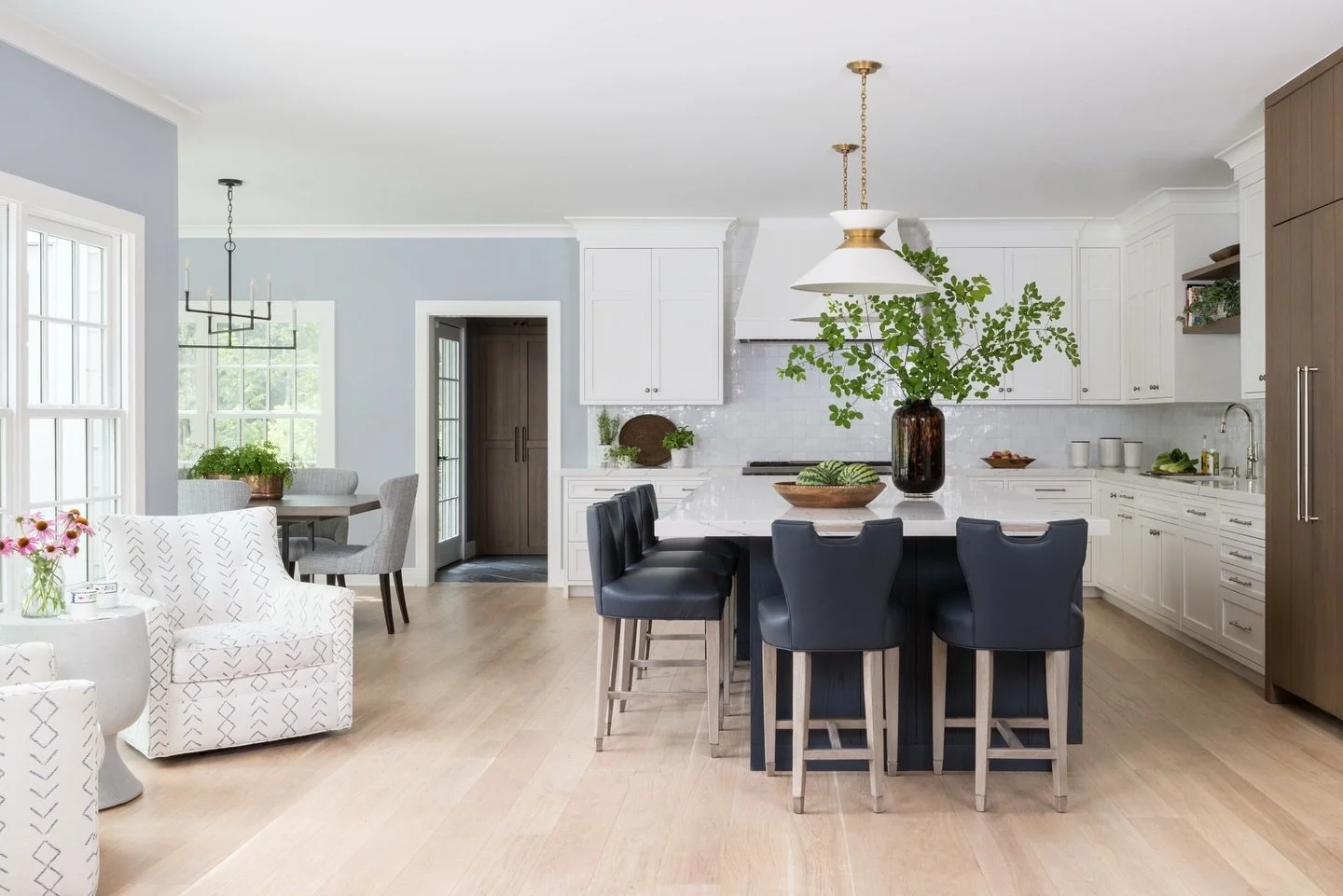 We had the pleasure of working with a longtime client to completely reimagine their home&mdash;from the kitchen, butler&rsquo;s pantry, and dining room to the primary suite, library, and beyond. With deep blue tones, airy finishes, and thoughtful det