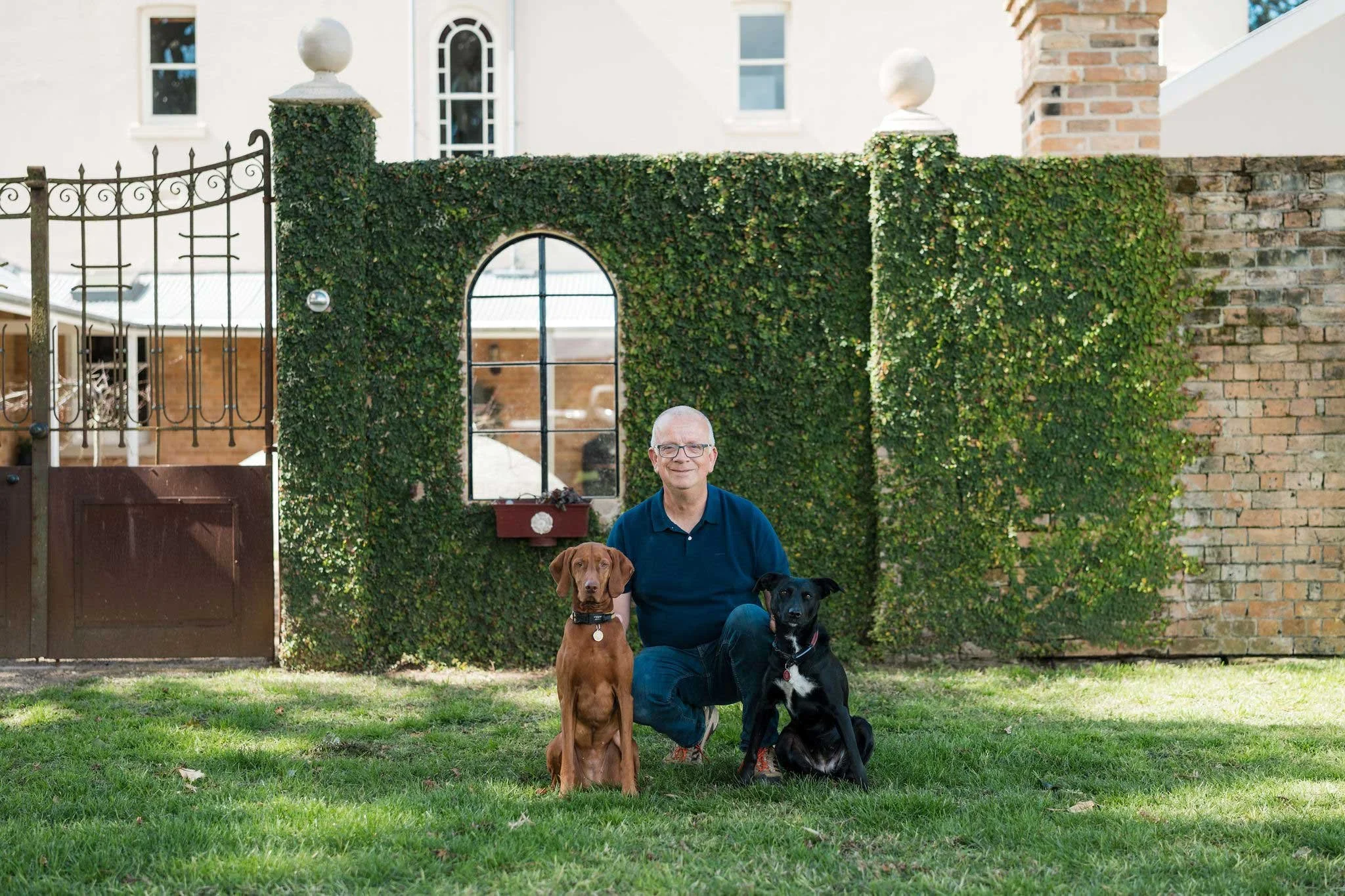 Owner outside Mount Airlie house Milton by New View Building Solutions