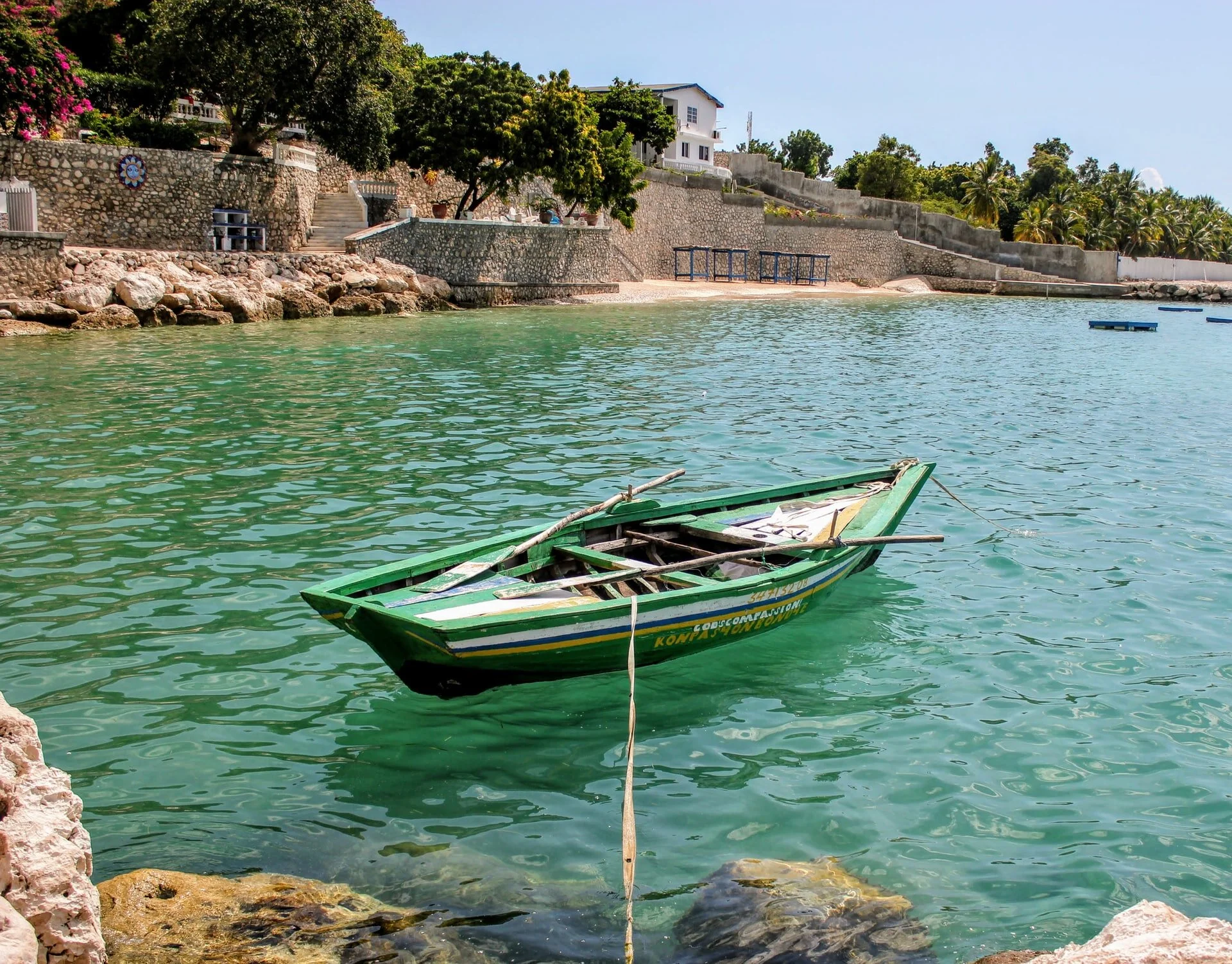Fishermen's Boat 🛶.
This small, colorful boat represents the vibrant maritime culture of Haiti. Many coastal communities rely on fishing for their livelihood. The turquoise water and the boat itself highlight the country's rich connection to the Car