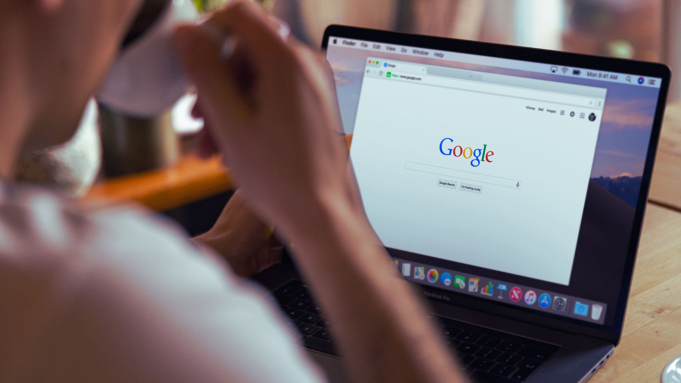 Person researching mortgage brokers and home loan options on Google using a laptop, representing finance Google Ads and online loan enquiries.