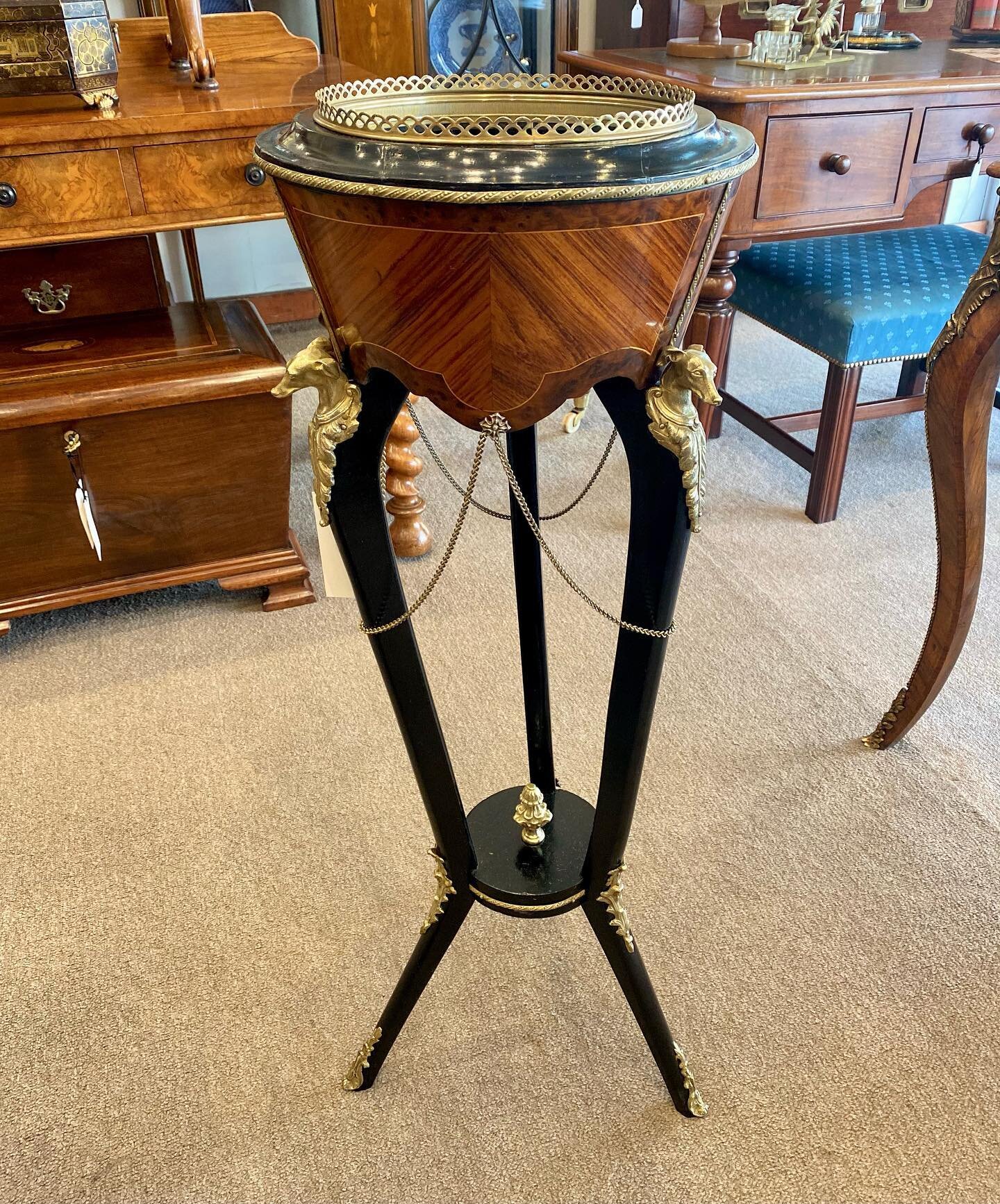 An exquisite ebonised late 19th century Napoleon lll style kingwood and  amboyna jardiniere, features whippet ormolu mounts, brass chain swag and pendants.