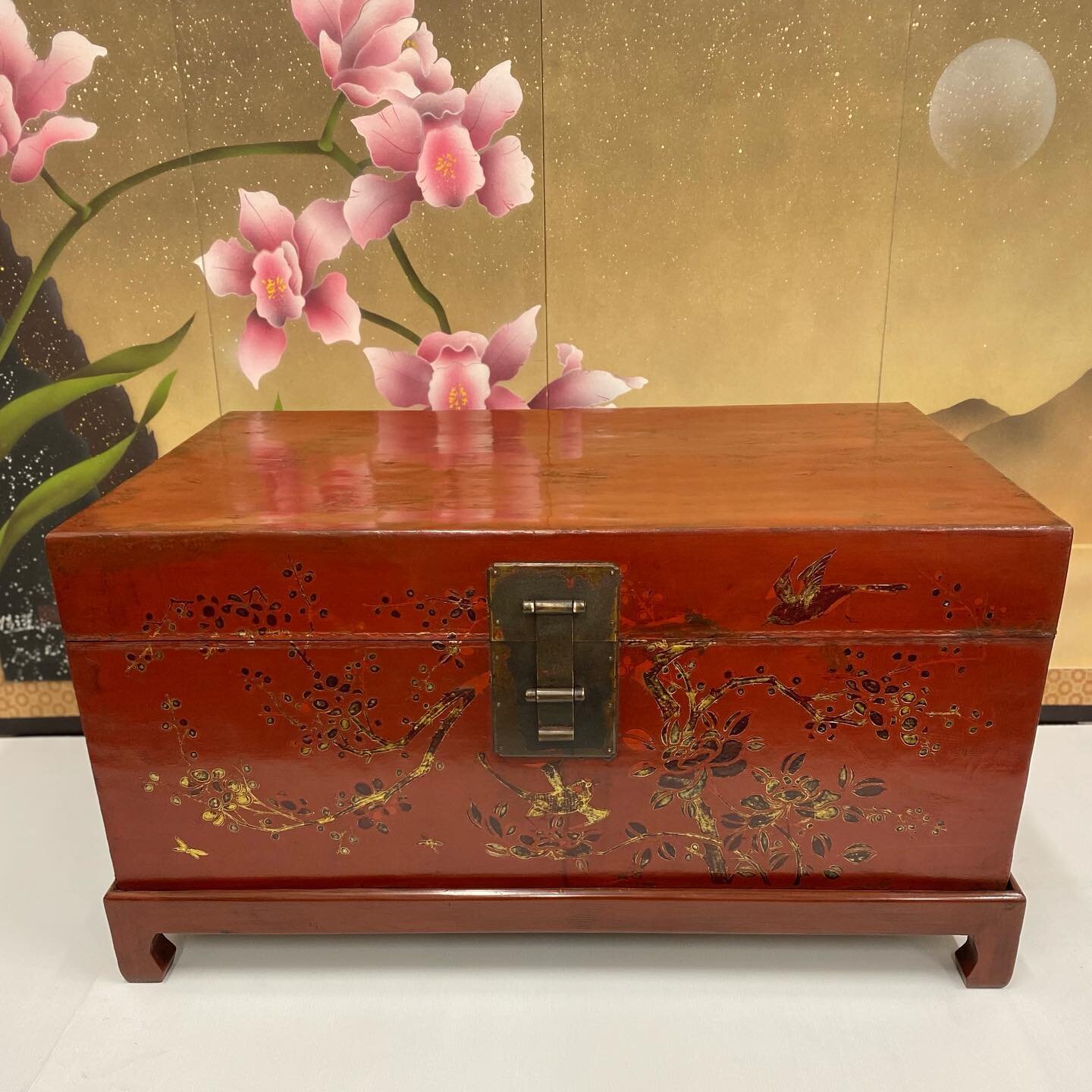 A recently restored 19th century red leather hand painted Chinese trunk on stand. Available at @hjquigleyantiques