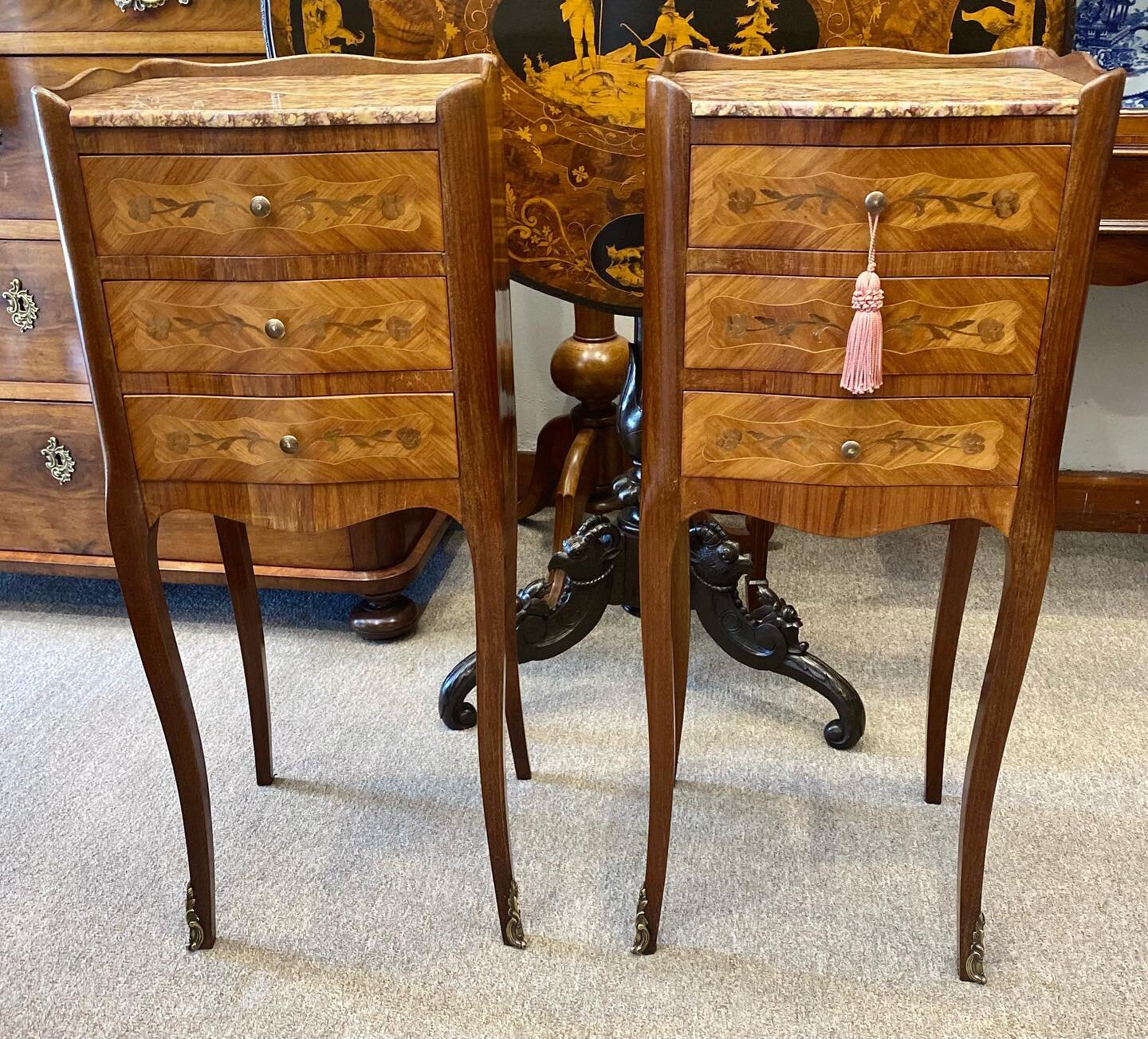 Just Arrived~ A sweet pair of early 20th century kingwood and inlay three drawer bedside cabinets, with gallery and marble tops.