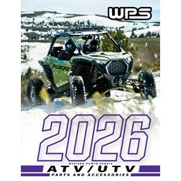 Off-road side-by-side vehicle driving through snowy terrain with a backdrop of snow-covered mountains and trees.