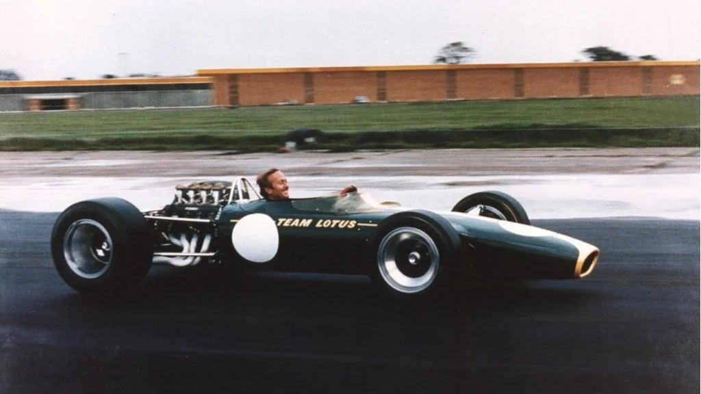 Colin-Chapman-in-Lotus-49-at-Hethel.jpg