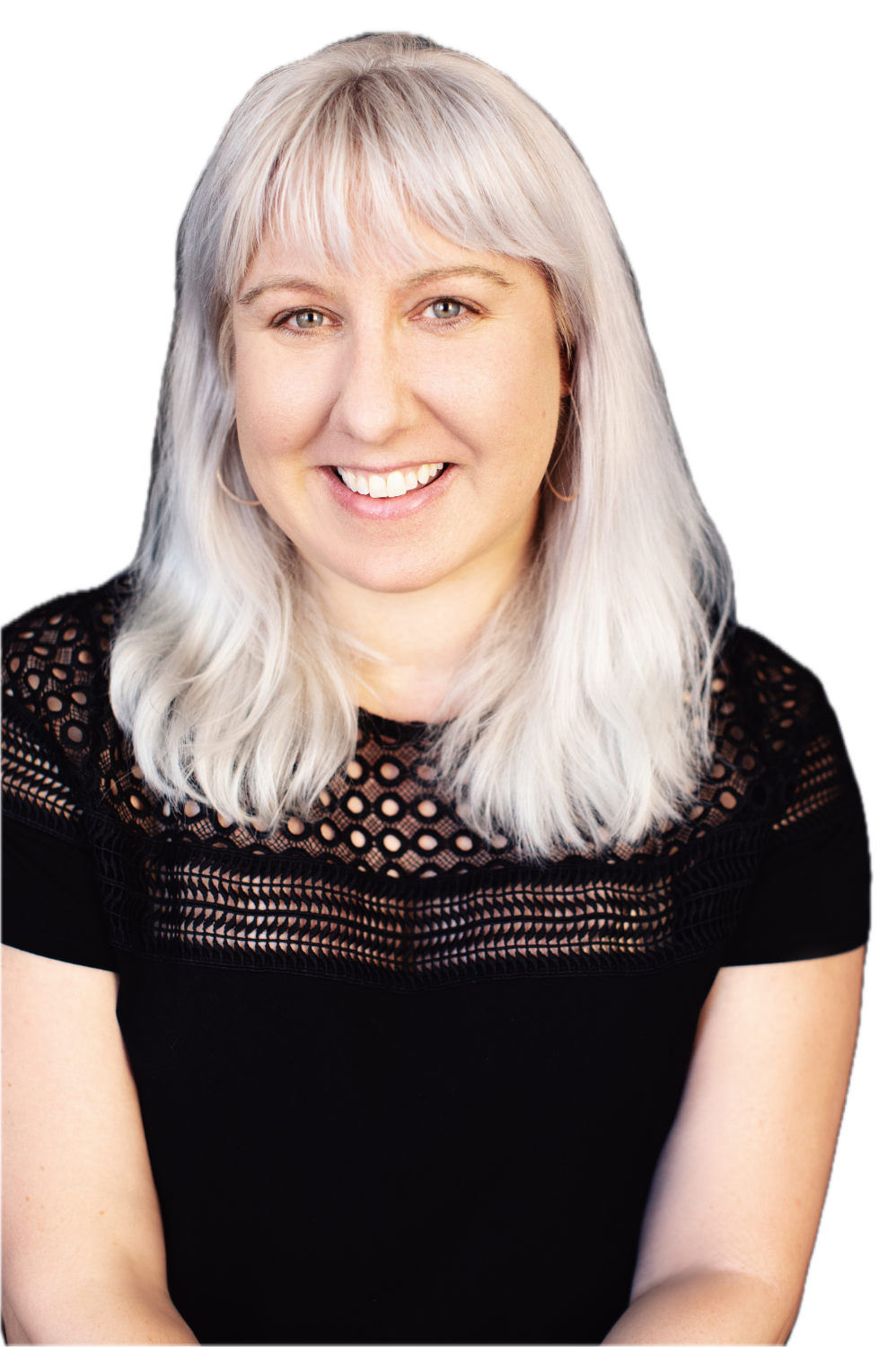 Kerry Savage profile picture - Portrait of a woman with platinum blonde hair, smiling, wearing a black top with lace details.