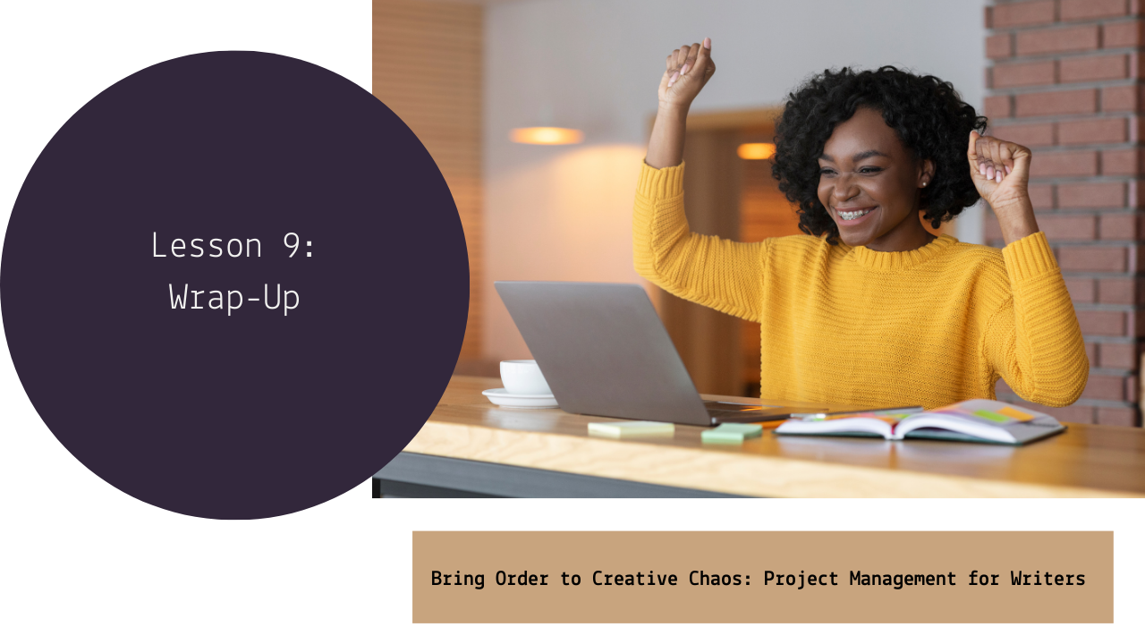 Woman in a yellow sweater celebrating success at her workspace with a laptop, notebooks, and sticky notes, after a lesson titled 'Lesson 9: Wrap-Up' on project management for writers.